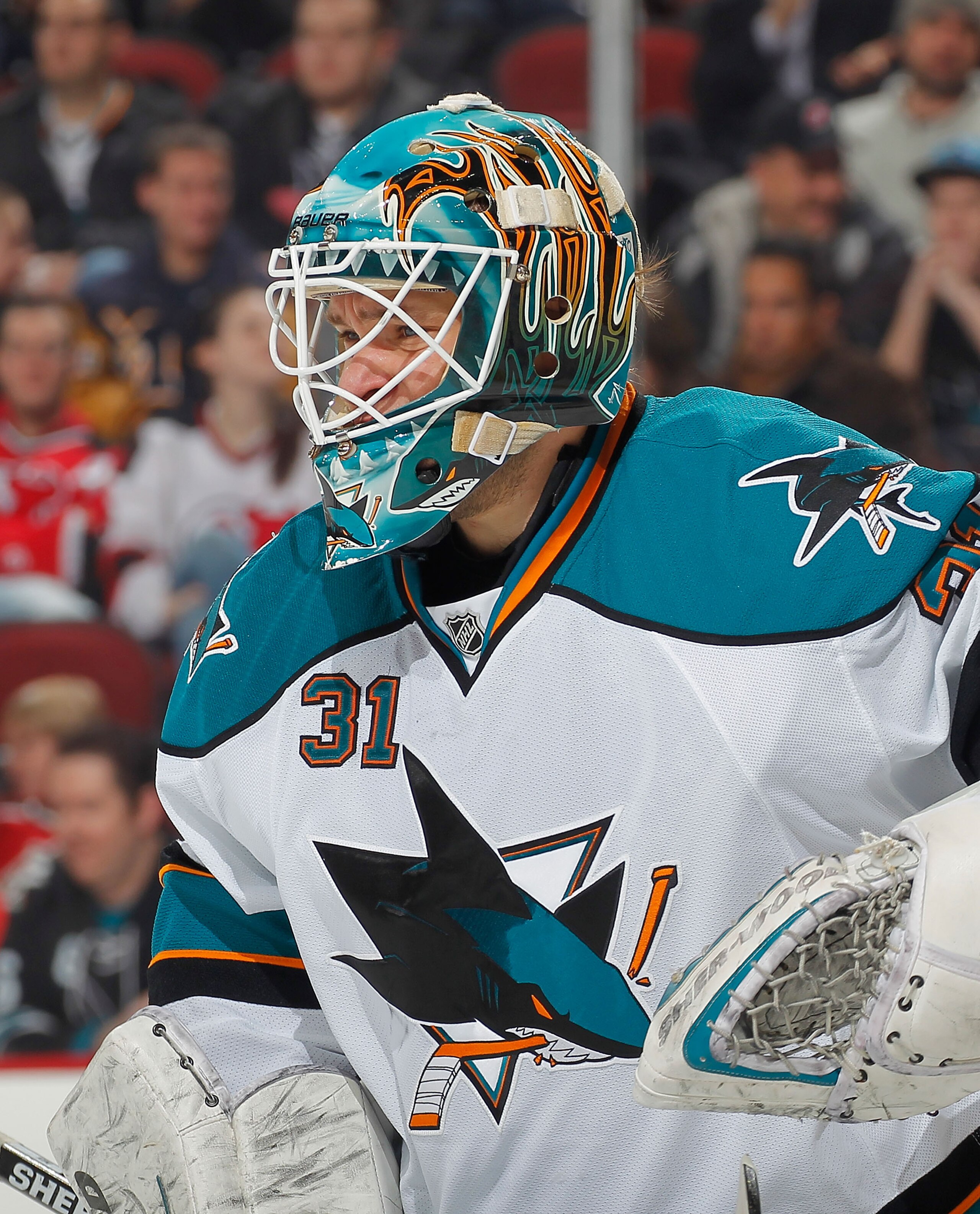 NEWARK, NJ - FEBRUARY 11: Goalie Antti Niemi #31 of the San Jose Sharks concentrates on a faceoff during an NHL hockey game against the New Jersey Devils on February 11, 2011 at the Prudential Center in Newark, New Jersey. (Photo by Paul Bereswill/Getty I