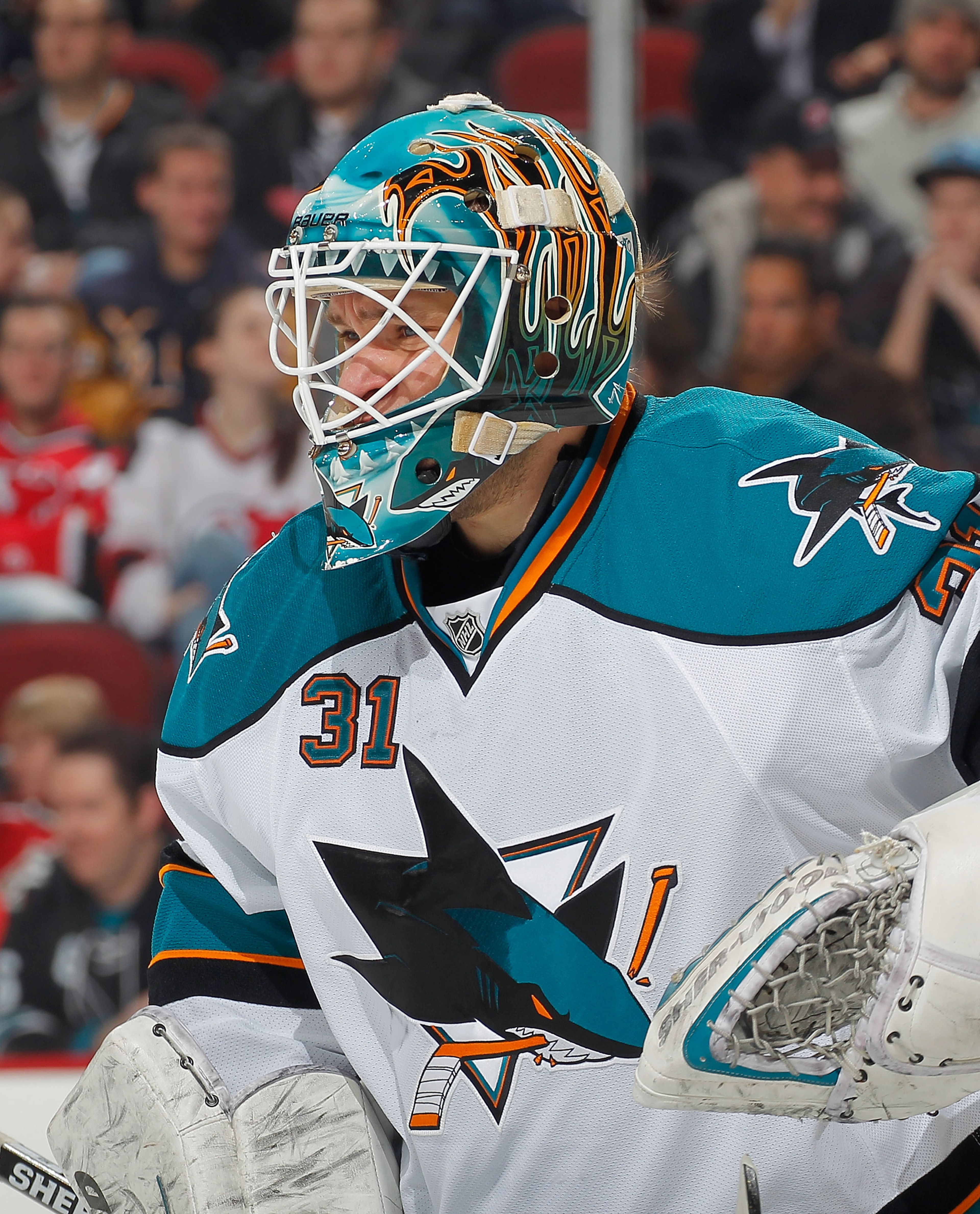 NEWARK, NJ - FEBRUARY 11: Goalie Antti Niemi #31 of the San Jose Sharks concentrates on a faceoff during an NHL hockey game against the New Jersey Devils on February 11, 2011 at the Prudential Center in Newark, New Jersey. (Photo by Paul Bereswill/Getty I