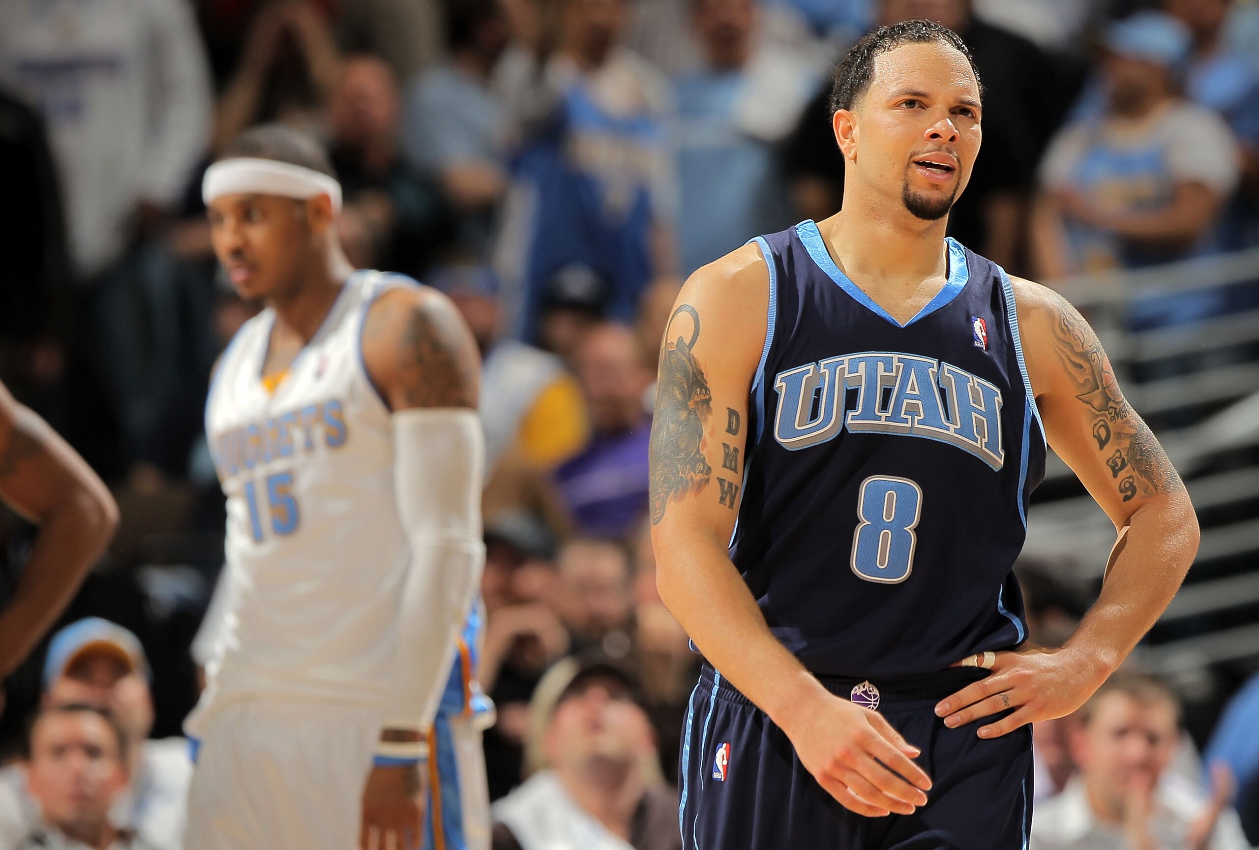 DENVER - APRIL 28:  Deron Williams #8 of the Utah Jazz reacts after being called for a foul against Carmelo Anthony #15 of the Denver Nuggets in Game Five of the Western Conference Quarterfinals of the 2010 NBA Playoffs at the Pepsi Center on April 28, 20