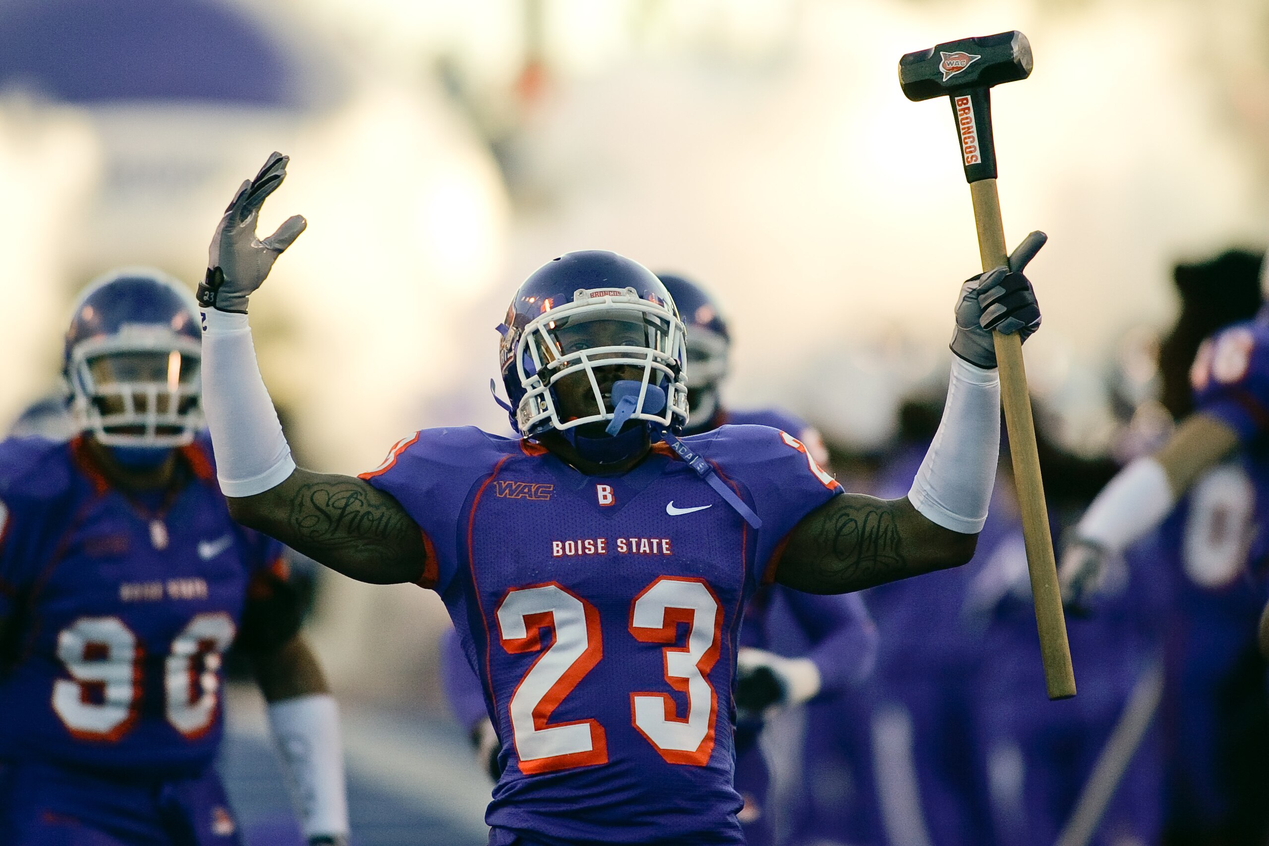 BOISE, ID - NOVEMBER 28:  Jeron Johnson #23 of the Boise State Broncos leads his team onto the field before their game against the Fresno State Bulldogs on November 28, 2008 at Bronco Stadium in Boise, Idaho.  (Photo by Otto Kitsinger III/Getty Images)