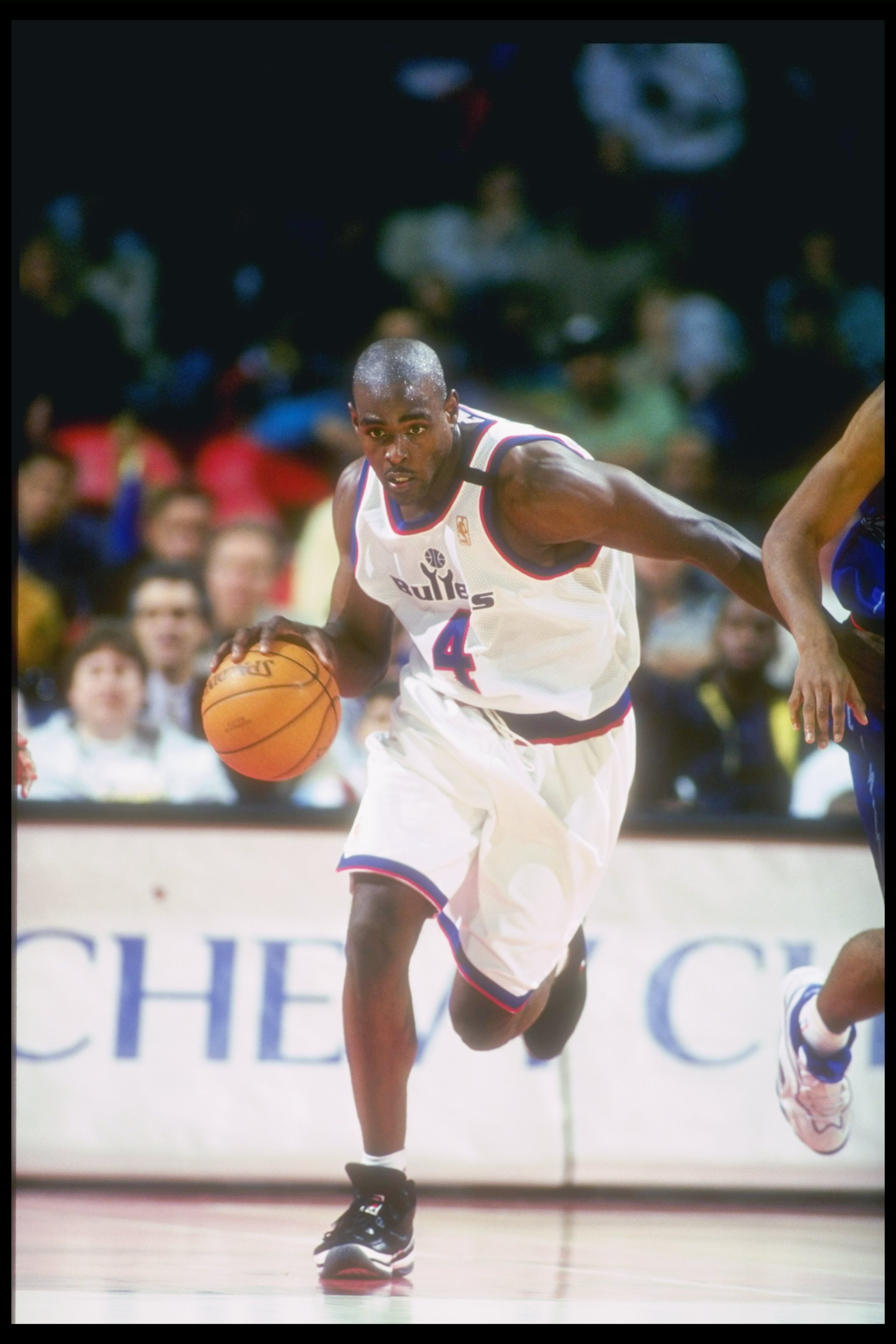 28 Mar 1997:  Forward Chris Webber of the Washington Bullets runs down the court during a game against the Toronto Raptors at the US Air Arena in Landover, Maryland.  The Bullets won the game 113 - 86. Mandatory Credit: Doug Pensinger  /Allsport