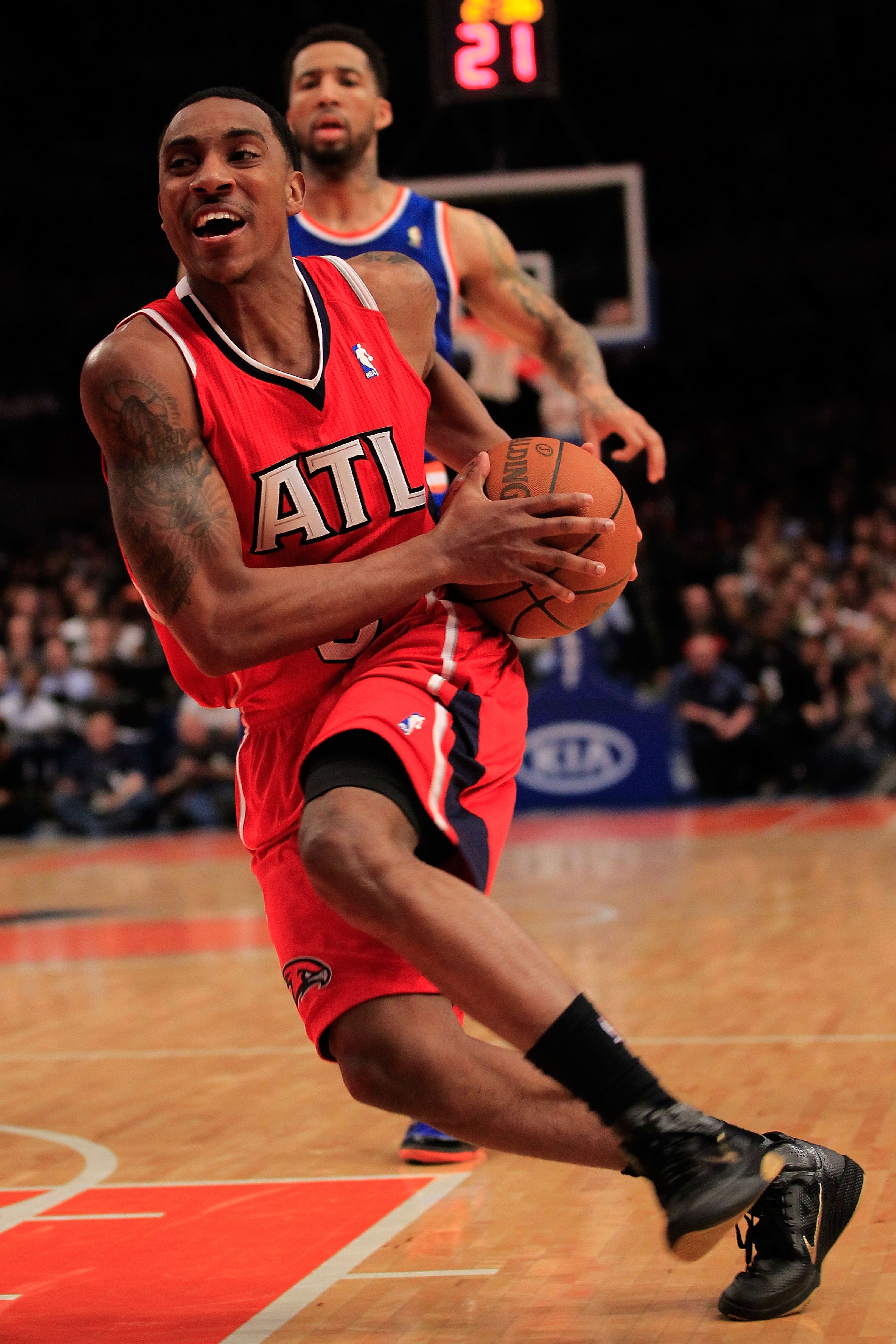 NEW YORK, NY - FEBRUARY 16: Josh Smith #5 of the Atlanta Hawks drives to the basket ahead of Wilson Chandler #21 of the New York Knicks at Madison Square Garden on February 16, 2011 in New York City. NOTE TO USER: User expressly acknowledges and agrees th