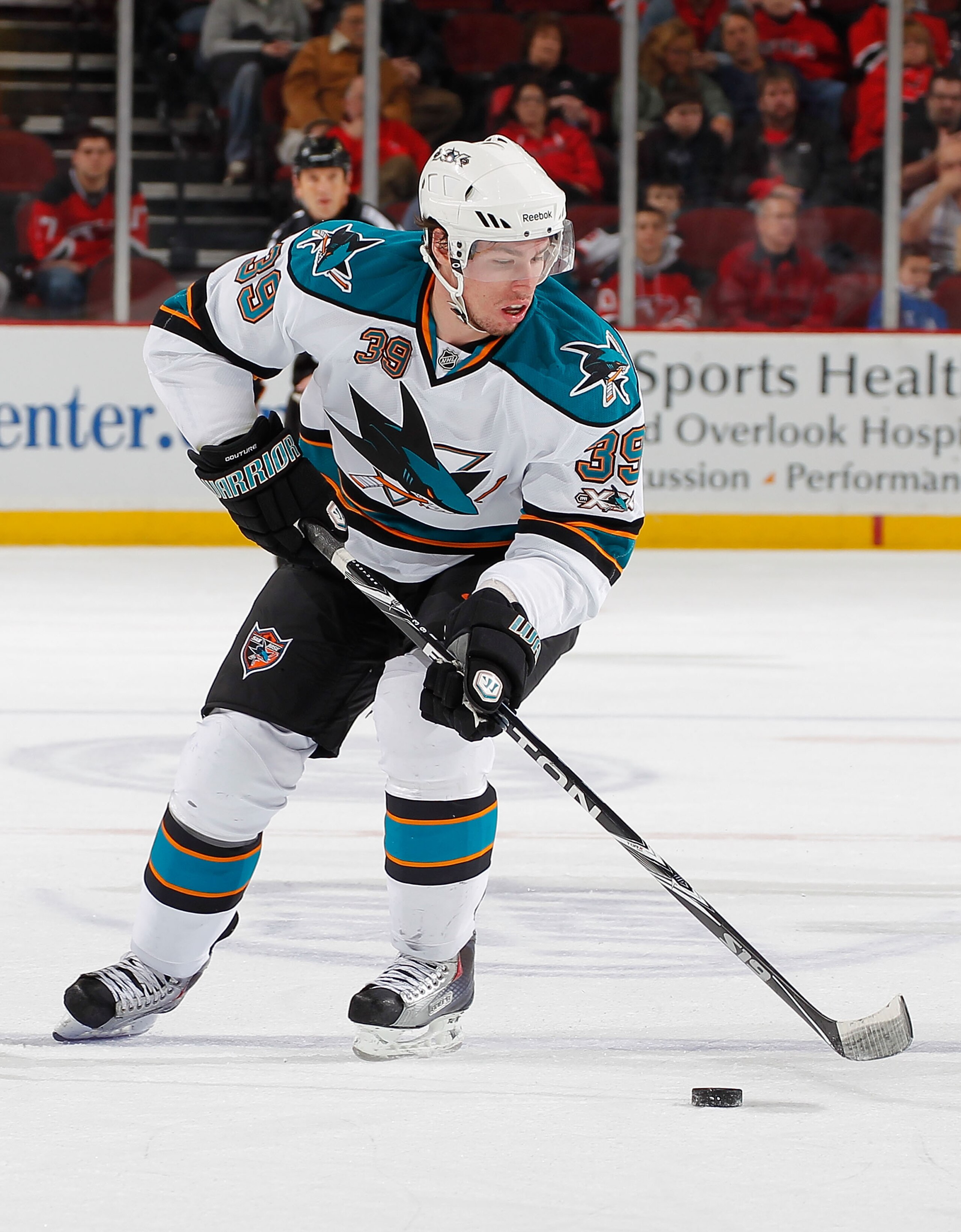 NEWARK, NJ - FEBRUARY 11: Logan Couture #39 of the San Jose Sharks skates during an NHL hockey game against the New Jersey Devils on February 11, 2011 at the Prudential Center in Newark, New Jersey. (Photo by Paul Bereswill/Getty Images) NEWARK, NJ - FEBRUARY 11: Logan Couture #39 of the San Jose Sharks skates during an NHL hockey game against the New Jersey Devils on February 11, 2011 at the Prudential Center in Newark, New Jersey. (Photo by Paul Bereswill/Getty Images)