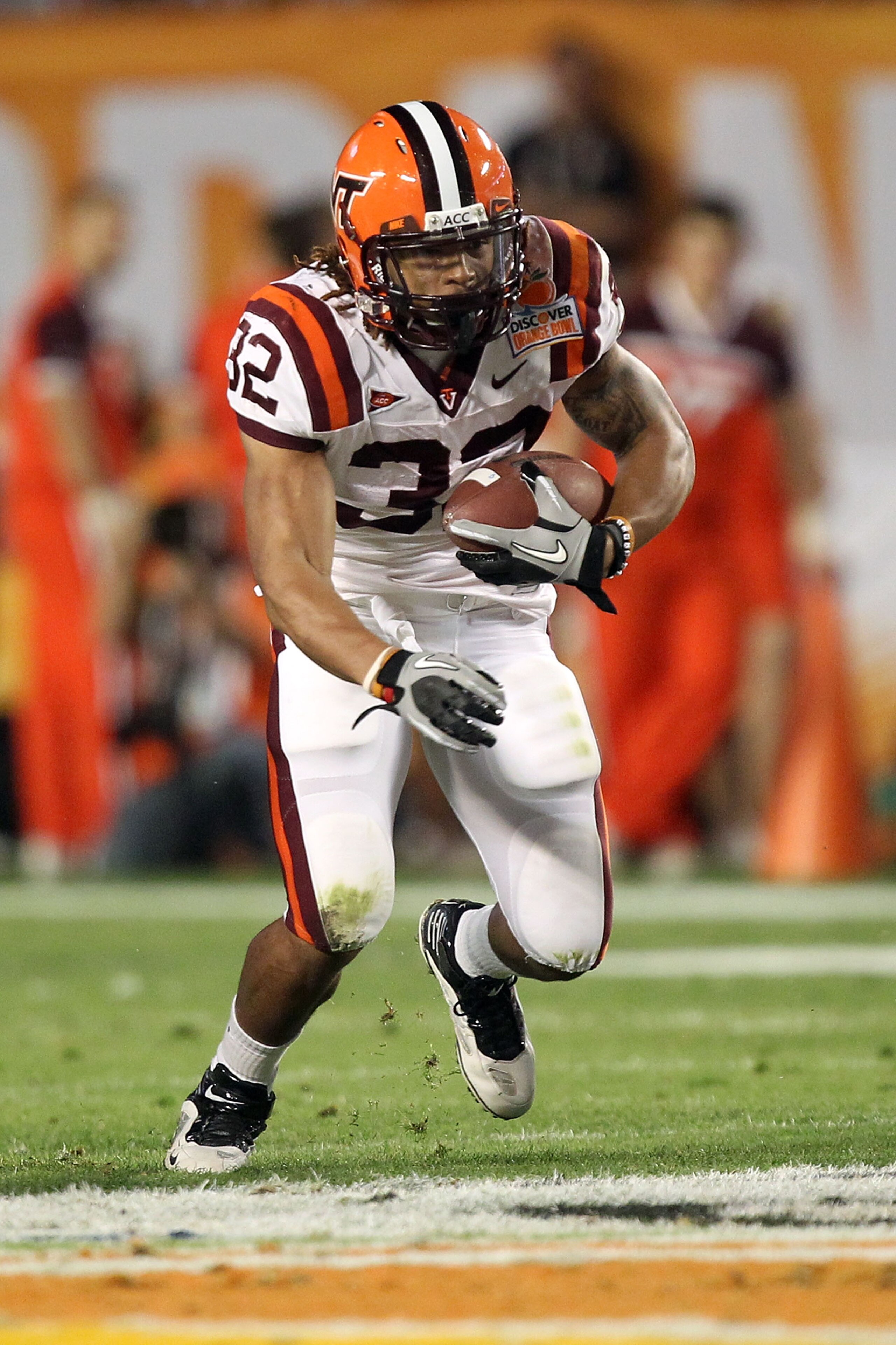 MIAMI, FL - JANUARY 03:  Darren Evans #32 of the Virginia Tech Hokies runs the ball against the Stanford Cardinal during the 2011 Discover Orange Bowl at Sun Life Stadium on January 3, 2011 in Miami, Florida. Stanford won 40-12.  (Photo by Streeter Lecka/