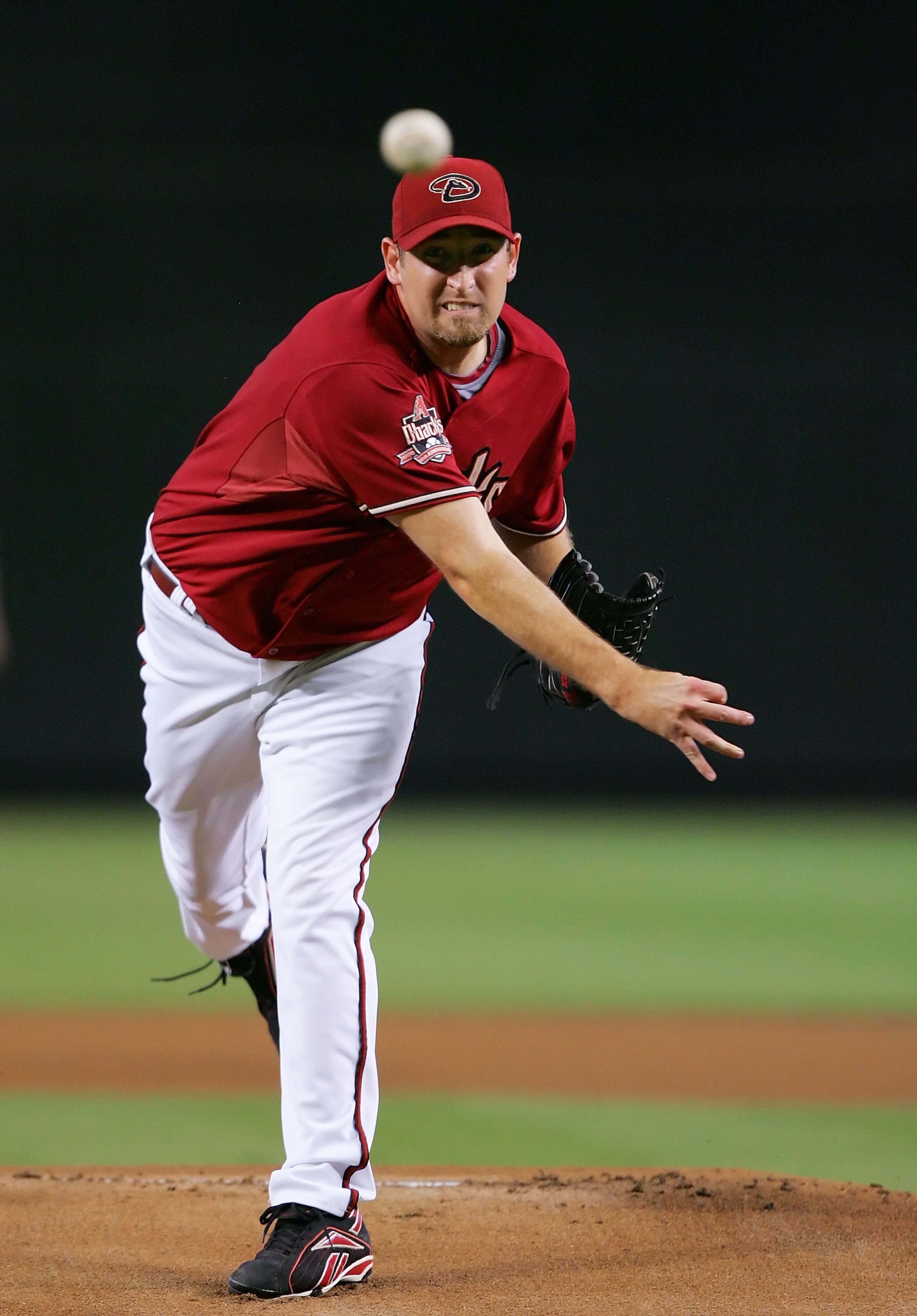 PHOENIX - AUGUST 05:  Brandon Webb #17 of the Arizona Diamondbacks pitches during a game against the Pittsburgh Pirates at Chase Field on August 5, 2008 in Phoenix, Arizona.  (Photo by Lisa Blumenfeld/Getty Images)
