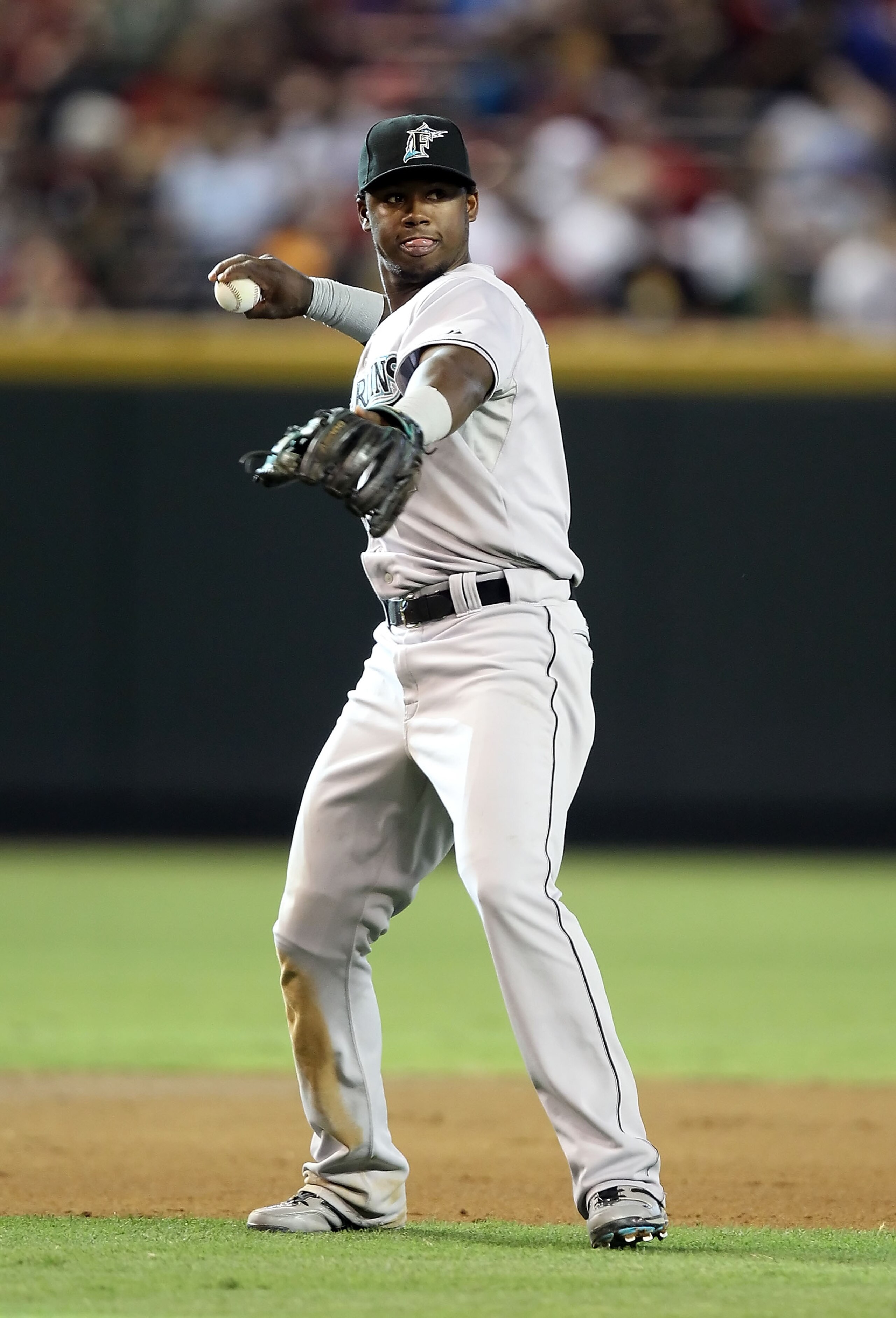 PHOENIX - JULY 10: Infielder Hanley Ramirez #2 of the Florida Marlins fields a ground ball during the Major League Baseball game against the Arizona Diamondbacks at Chase Field on July 10, 2010 in Phoenix, Arizona. The Diamondbacks defeated the Marlins PHOENIX - JULY 10: Infielder Hanley Ramirez #2 of the Florida Marlins fields a ground ball during the Major League Baseball game against the Arizona Diamondbacks at Chase Field on July 10, 2010 in Phoenix, Arizona. The Diamondbacks defeated the Marlins