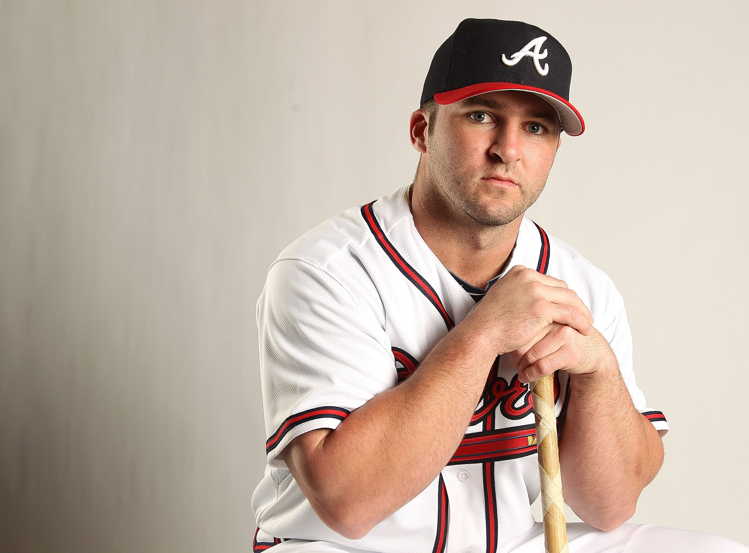 LAKE BUENA VISTA, FL - FEBRUARY 21: Dan Uggla #26 of the Atlanta Braves during Photo Day at  Champion Stadium at ESPN Wide World of Sports of Complex on February 21, 2011 in Lake Buena Vista, Florida. (Photo by Mike Ehrmann/Getty Images)