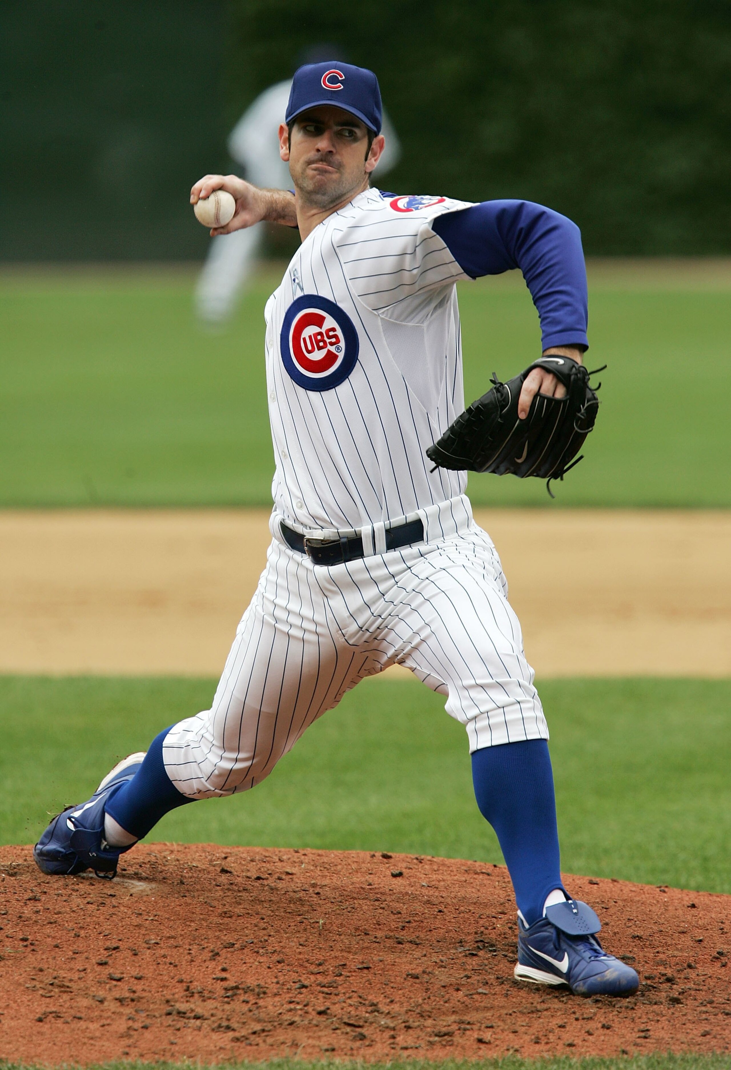 CHICAGO - JUNE 18:  Mark Prior #22 of the Chicago Cubs delivers the ball against the Detroit Tigers on June 18, 2006 at Wrigley Field in Chicago, Illinois. The Tigers defeated the Cubs 12-3.  (Photo by Jonathan Daniel/Getty Images)