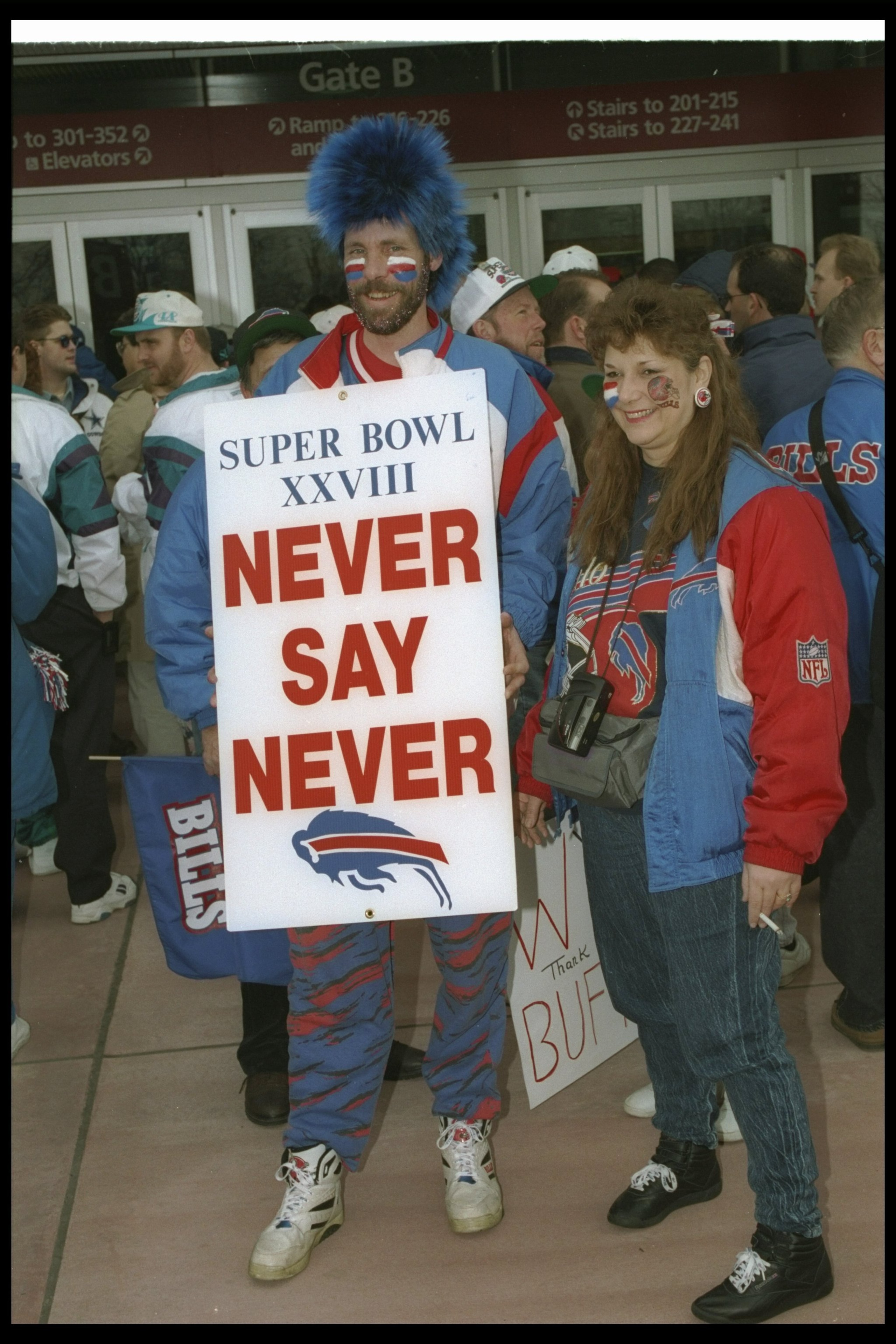 30 Jan 1994:  Buffalo Bills fans display signs before Super Bowl XXVIII against the Dallas Cowboys at the Georgia Dome in Atlanta, Georgia.  The Cowboys won the game, 30-13. Mandatory Credit: Stephen Dunn  /Allsport