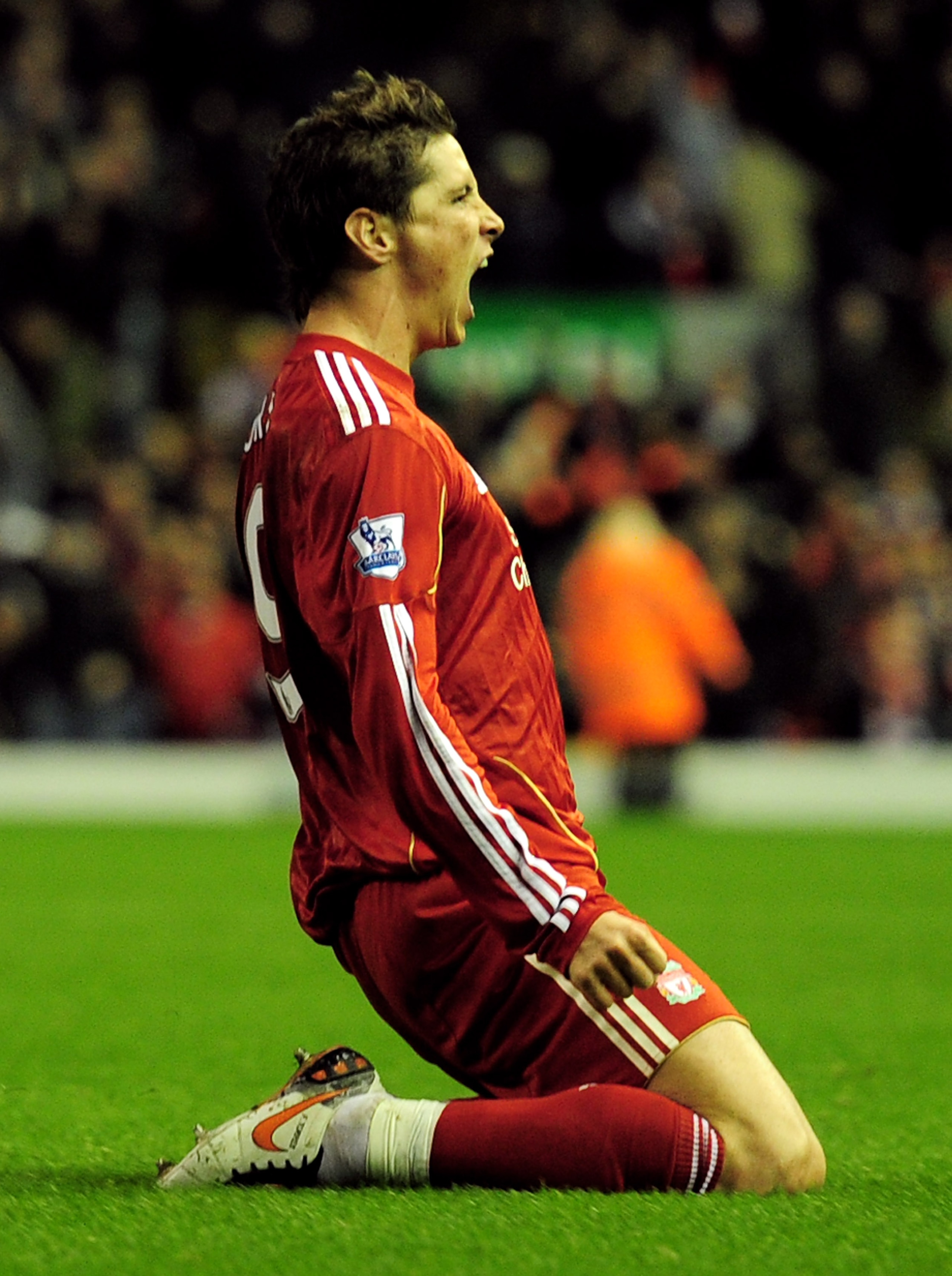 LIVERPOOL, ENGLAND - NOVEMBER 07:  Fernando Torres of Liverpool celebrates scoring his team's second goal during the Barclays Premier League match between Liverpool and Chelsea at Anfield on November 7, 2010 in Liverpool, England.  (Photo by Shaun Botteri