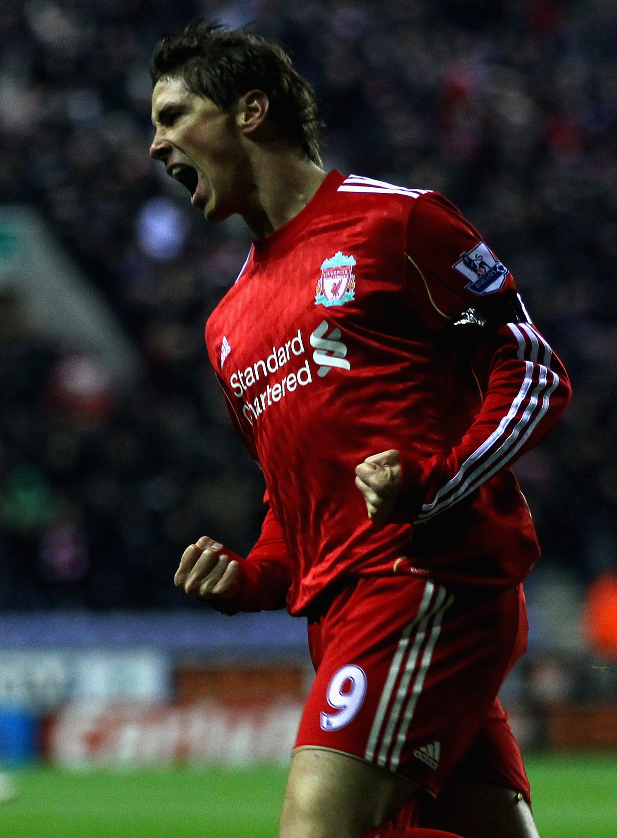 WIGAN, ENGLAND - NOVEMBER 10:  Fernando Torres  of Liverpool celebrates after scoring the first goal during the Barclays Premier League match between Wigan Athletic and Liverpool at DW Stadium on November 10, 2010 in Wigan, England.  (Photo by Clive Bruns