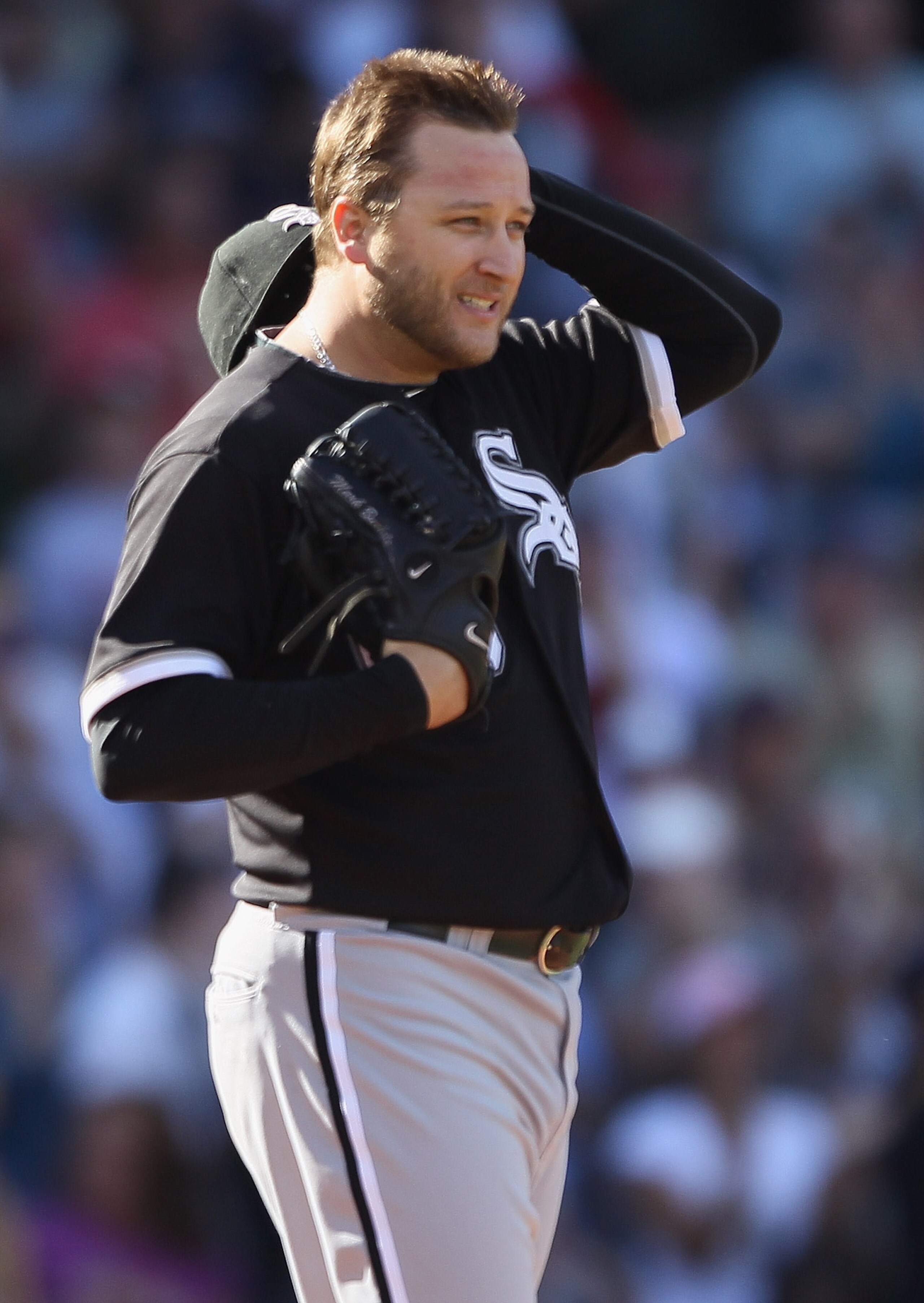 BOSTON - SEPTEMBER 05: Mark Buehrle #56 of the Chicago White Sox reacts after giving up a two run homer to Victor Martinez of the Boston Red Sox in the seventh inning on September 5, 2010 at Fenway Park in Boston, Massachusetts. (Photo by Elsa/Getty Ima BOSTON - SEPTEMBER 05: Mark Buehrle #56 of the Chicago White Sox reacts after giving up a two run homer to Victor Martinez of the Boston Red Sox in the seventh inning on September 5, 2010 at Fenway Park in Boston, Massachusetts. (Photo by Elsa/Getty Ima