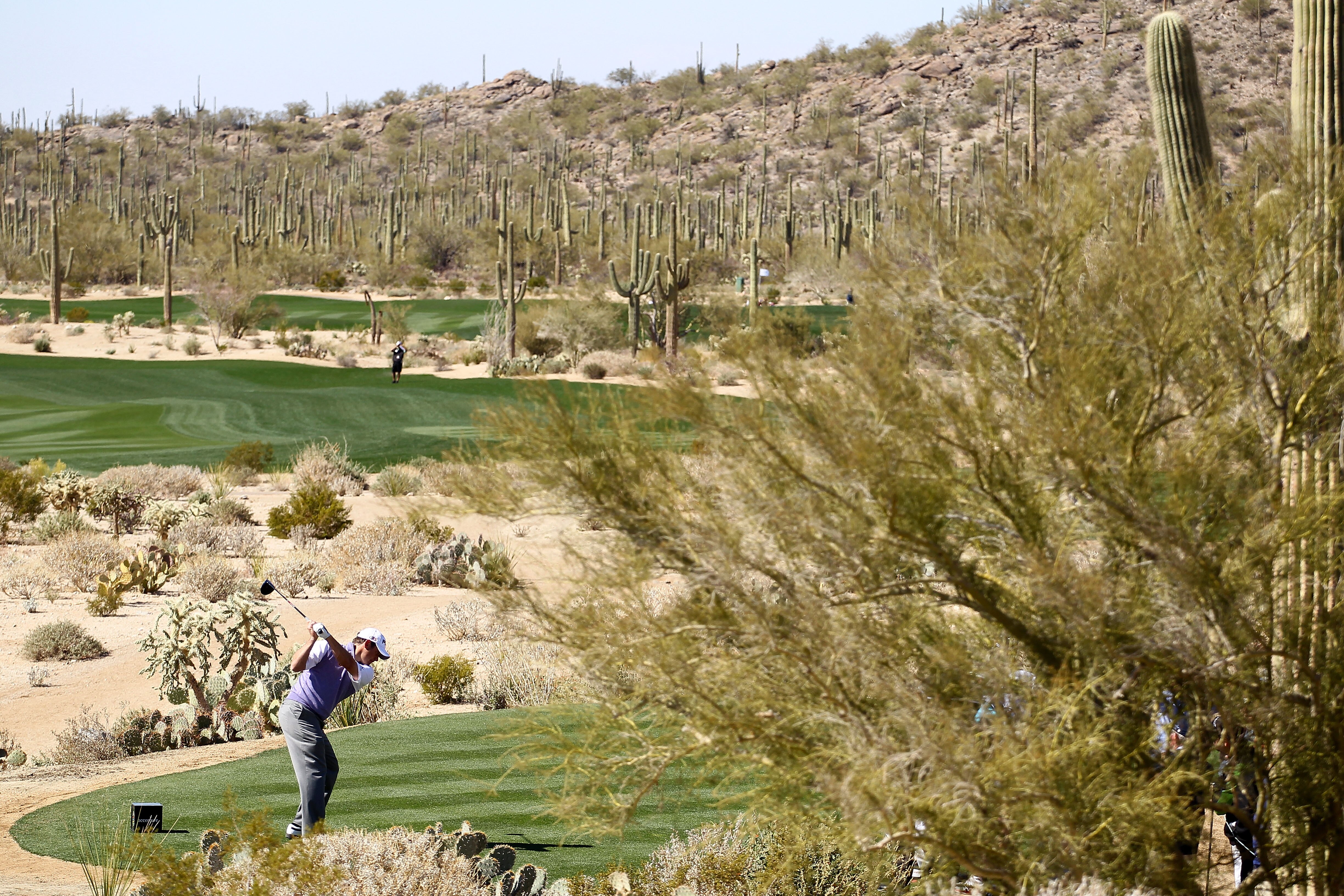 MARANA, AZ - FEBRUARY 23:  Lee Westwood of England hits his tee shot on the fifth hole during the first round of the Accenture Match Play Championship at the Ritz-Carlton Golf Club on February 23, 2011 in Marana, Arizona.  (Photo by Andy Lyons/Getty Image