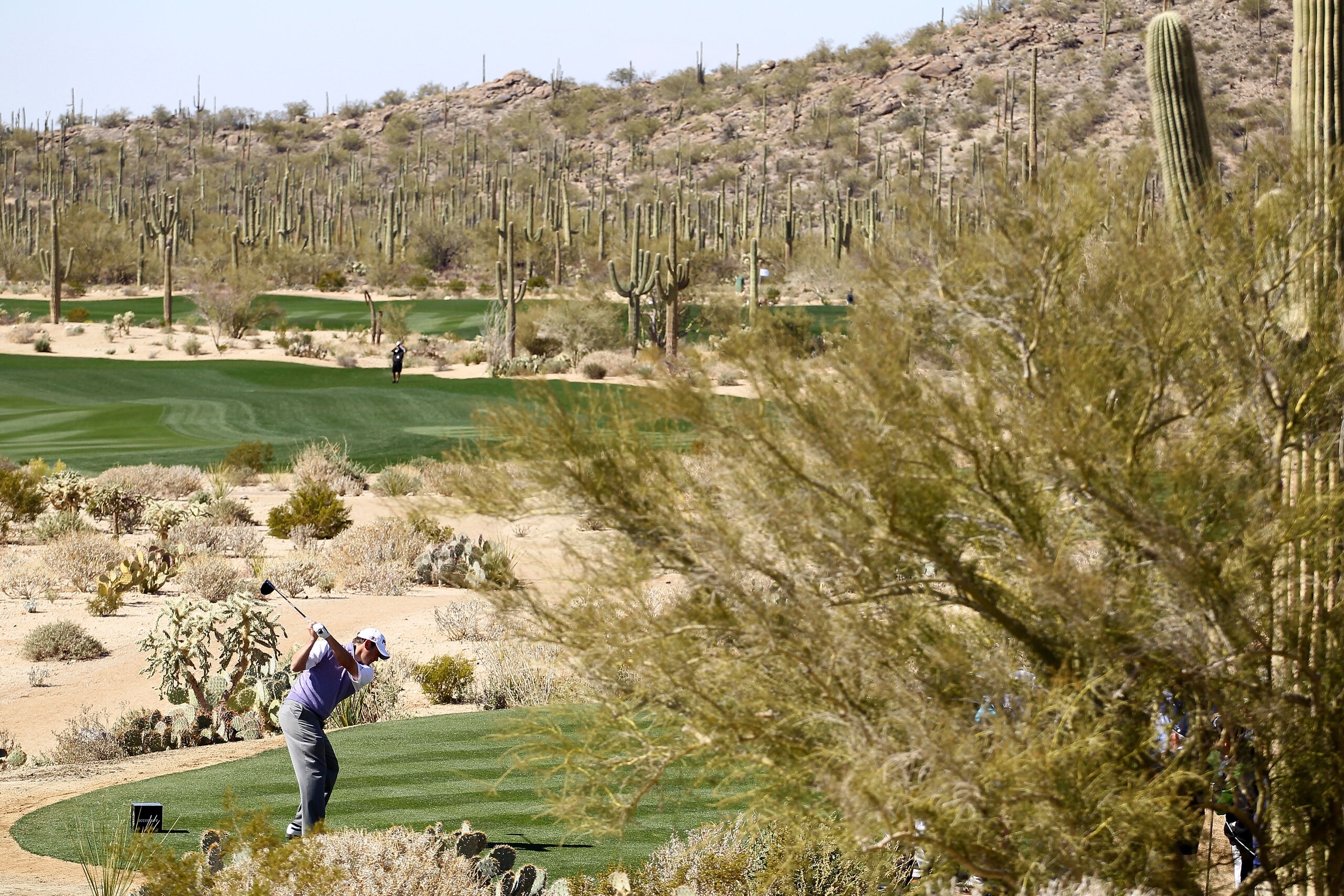 MARANA, AZ - FEBRUARY 23:  Lee Westwood of England hits his tee shot on the fifth hole during the first round of the Accenture Match Play Championship at the Ritz-Carlton Golf Club on February 23, 2011 in Marana, Arizona.  (Photo by Andy Lyons/Getty Image