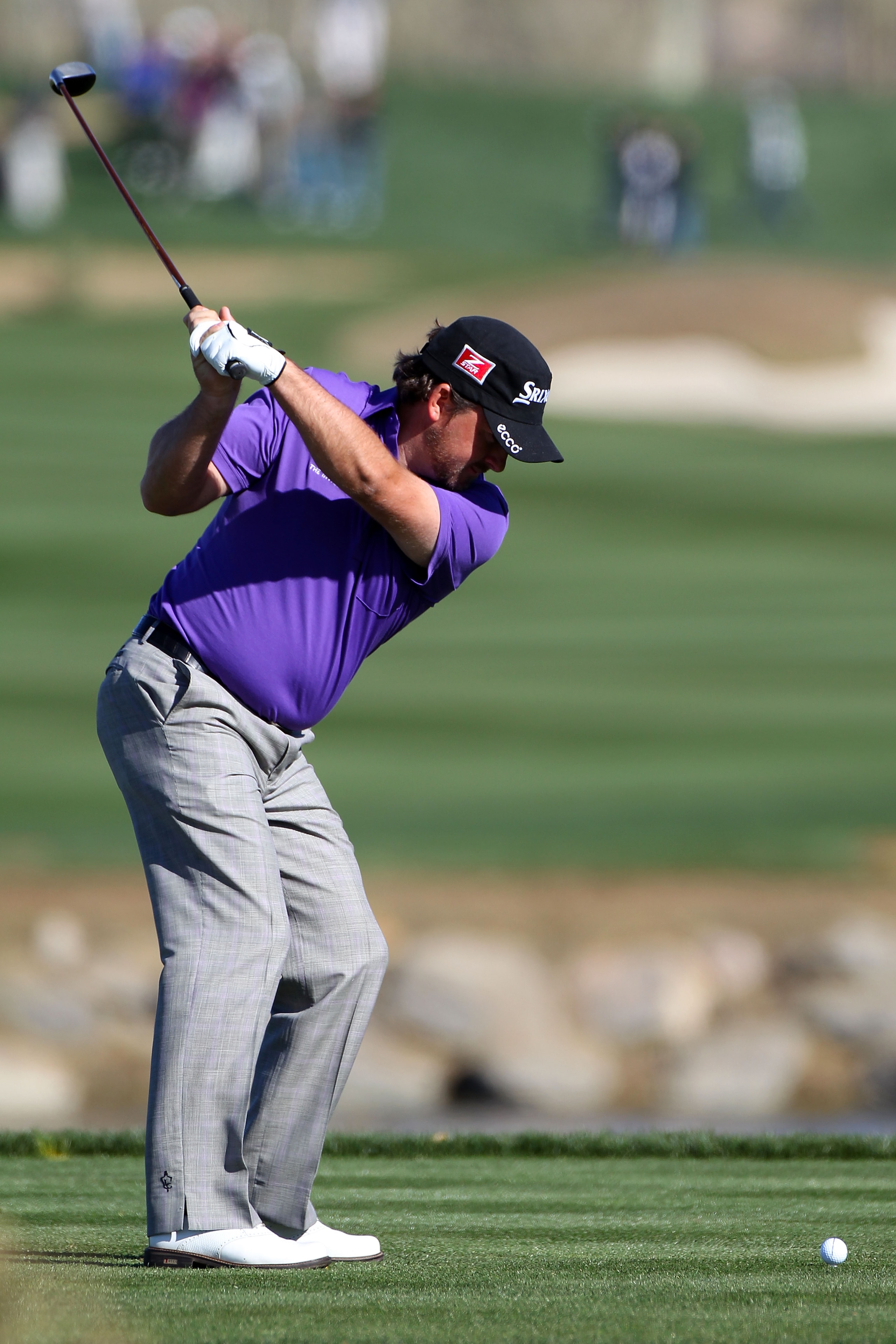 MARANA, AZ - FEBRUARY 23:  Graeme McDowell of Northern Ireland hits his tee shot on the fourth hole during the first round of the Accenture Match Play Championship at the Ritz-Carlton Golf Club on February 23, 2011 in Marana, Arizona.  (Photo by Sam Green