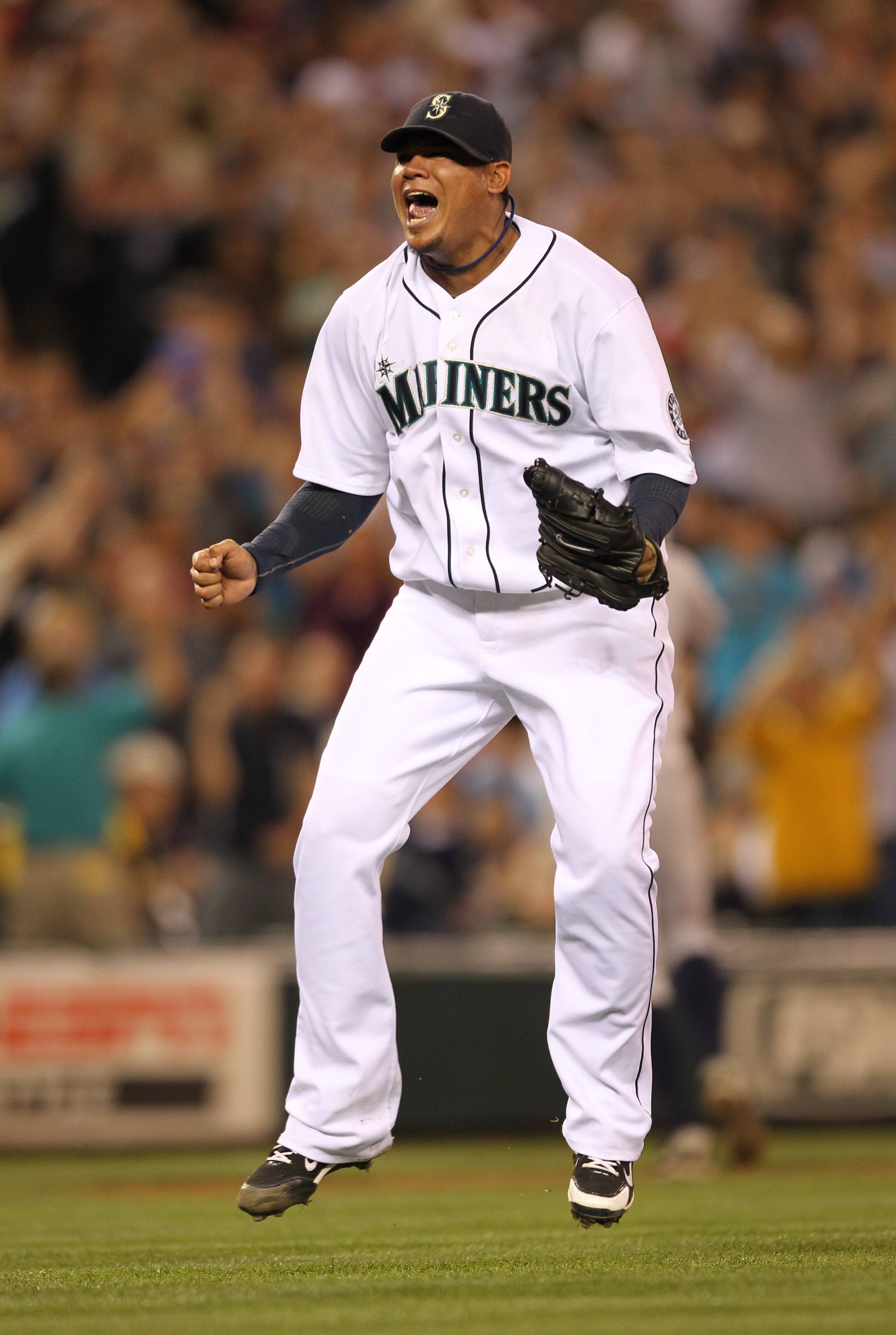 SEATTLE - JULY 10:  Starting pitcher Felix Hernandez #34 of the Seattle Mariners reacts after defeating the New York Yankees 4-1 at Safeco Field on July 10, 2010 in Seattle, Washington. (Photo by Otto Greule Jr/Getty Images)