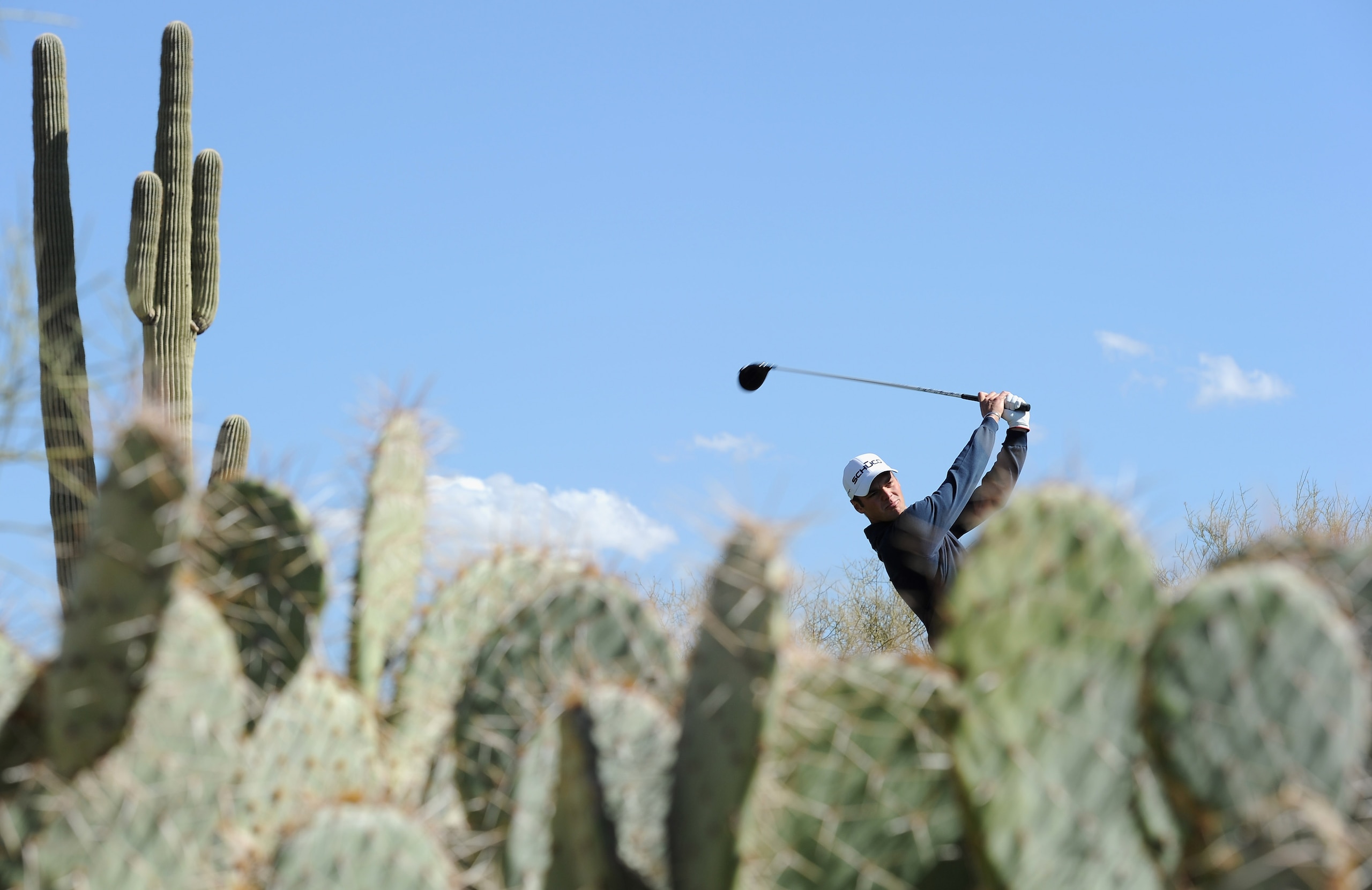MARANA, AZ - FEBRUARY 23: Martin Kaymer of Germany plays his tee shot on the second hole during the first round of the World Golf Championships-Accenture Match Play Championship held at The Ritz-Carlton Golf Club, Dove Mountain on February 23, 2011 in Mar