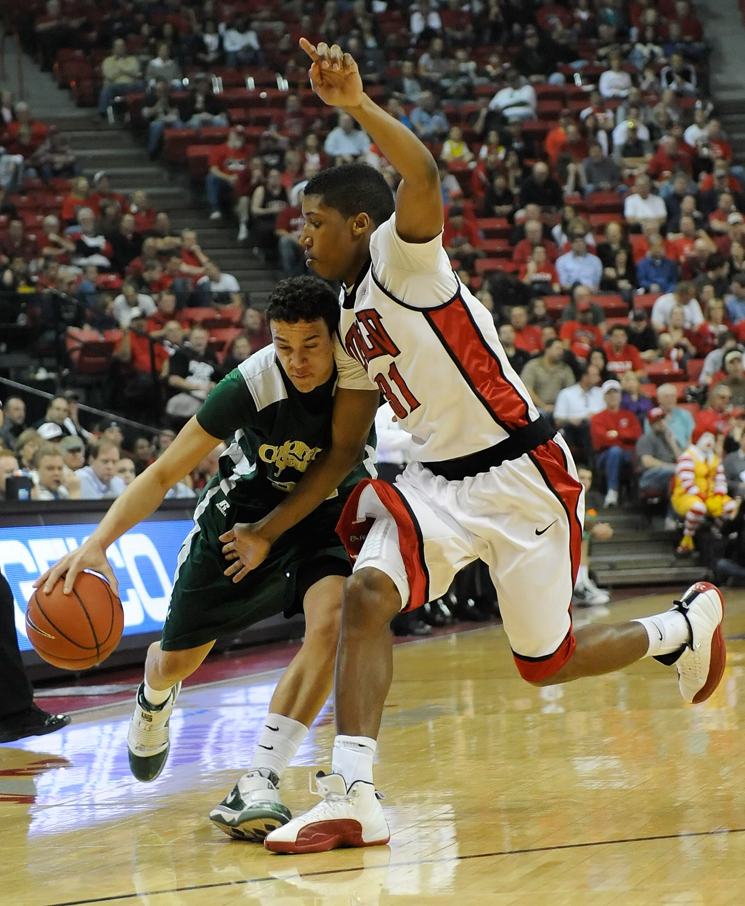 LAS VEGAS - FEBRUARY 20:  Dorian Green #22 of the Colorado State Rams drives against Justin Hawkins #31 of the UNLV Rebels during their game at the Thomas & Mack Center February 20, 2010 in Las Vegas, Nevada.  (Photo by Ethan Miller/Getty Images)