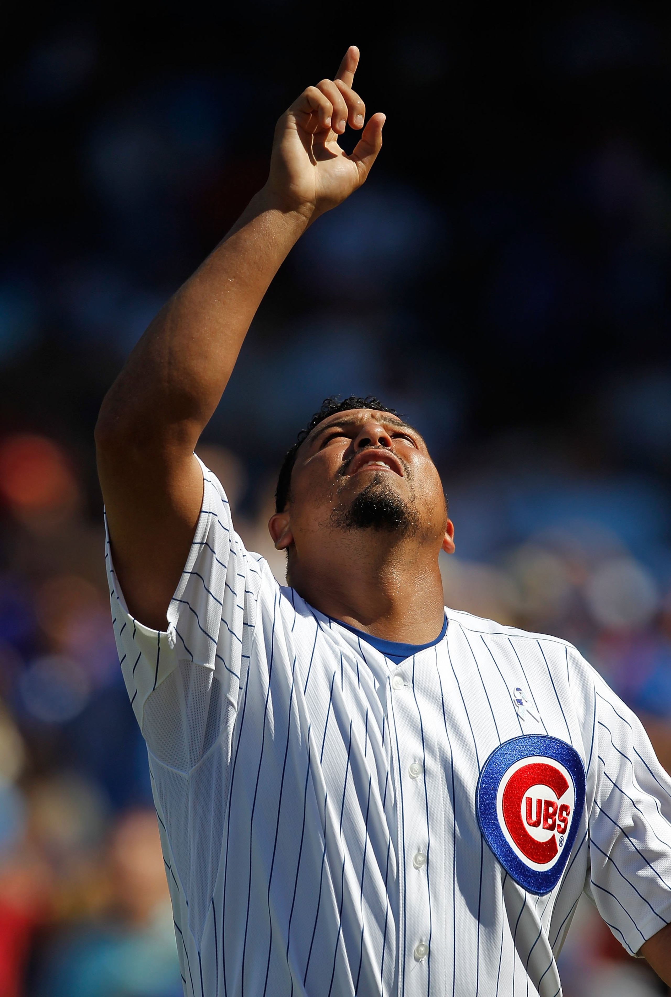 CHICAGO - JUNE 20: Starting pitcher Carlos Zambrano #38 of the Chicago Cubs points to the sky after finishing an inning pitching against the Los Angeles Angels of Anaheim at Wrigley Field on June 20, 2010 in Chicago, Illinois. The Cubs defeated the Angels CHICAGO - JUNE 20: Starting pitcher Carlos Zambrano #38 of the Chicago Cubs points to the sky after finishing an inning pitching against the Los Angeles Angels of Anaheim at Wrigley Field on June 20, 2010 in Chicago, Illinois. The Cubs defeated the Angels