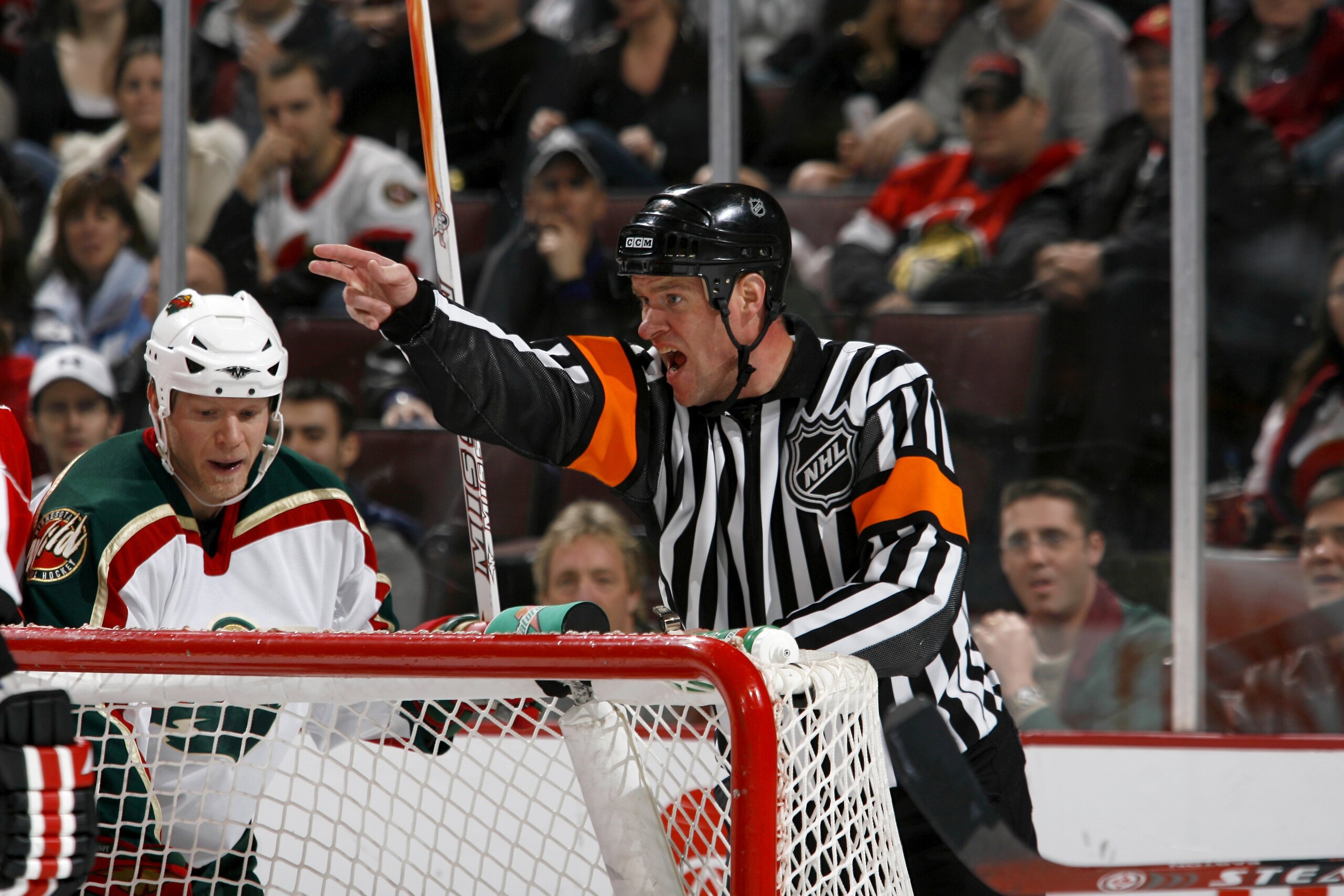 OTTAWA, CANADA - NOVEMBER 20: Dave Jackson calls a penalty shot against the Ottawa Senators after goal mouth scramble in a game against the Minnesota Wild on November 20, 2006 at the Scotiabank Place in Ottawa, Canada. The Senators won 5-3. (Photo by Phil OTTAWA, CANADA - NOVEMBER 20: Dave Jackson calls a penalty shot against the Ottawa Senators after goal mouth scramble in a game against the Minnesota Wild on November 20, 2006 at the Scotiabank Place in Ottawa, Canada. The Senators won 5-3. (Photo by Phil