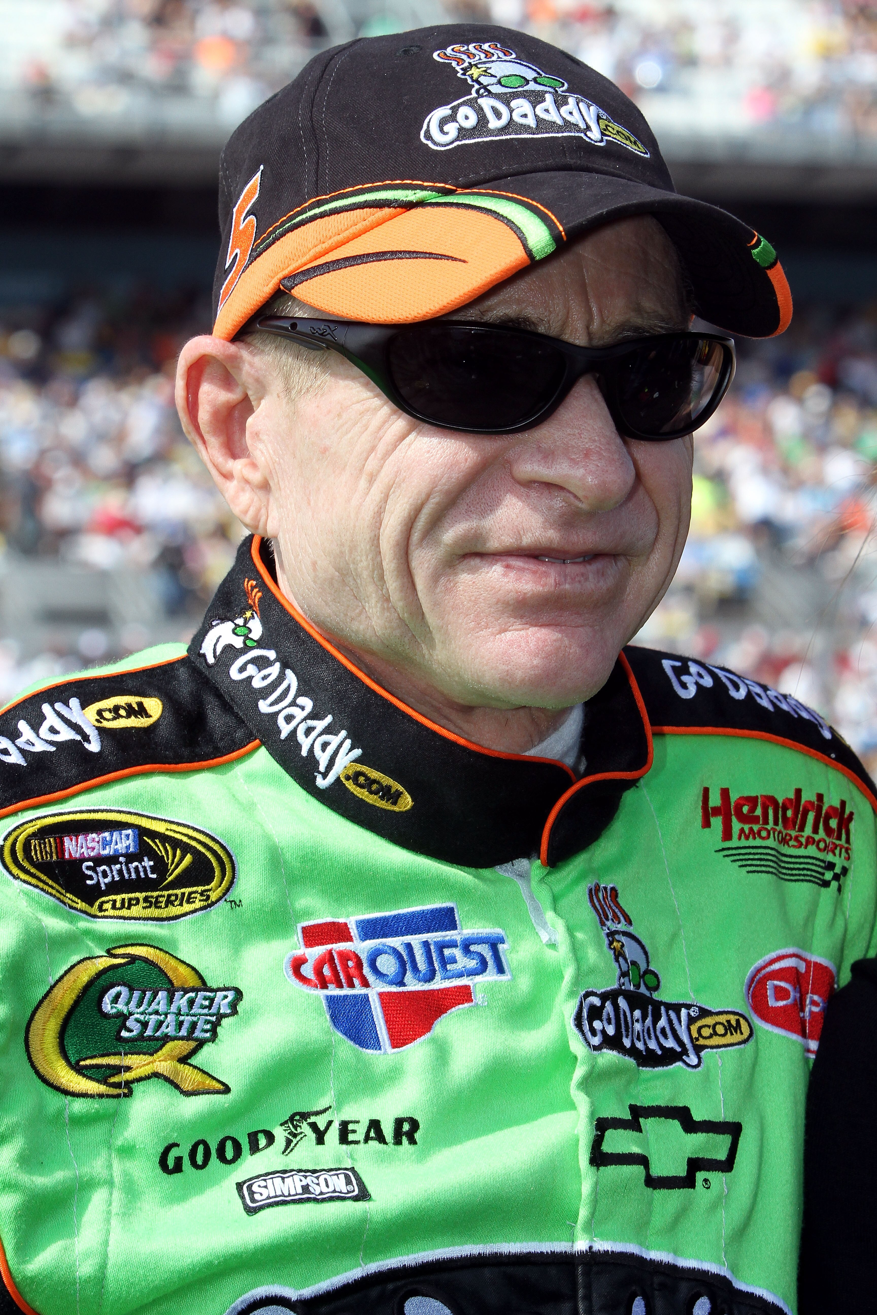 DAYTONA BEACH, FL - FEBRUARY 17:  Mark Martin, driver of the #5 GoDaddy.com Chevrolet, stands on the grid prior to the first race of the NASCAR Sprint Cup Series Gatorade Duel at Daytona International Speedway on February 17, 2011 in Daytona Beach, Florid