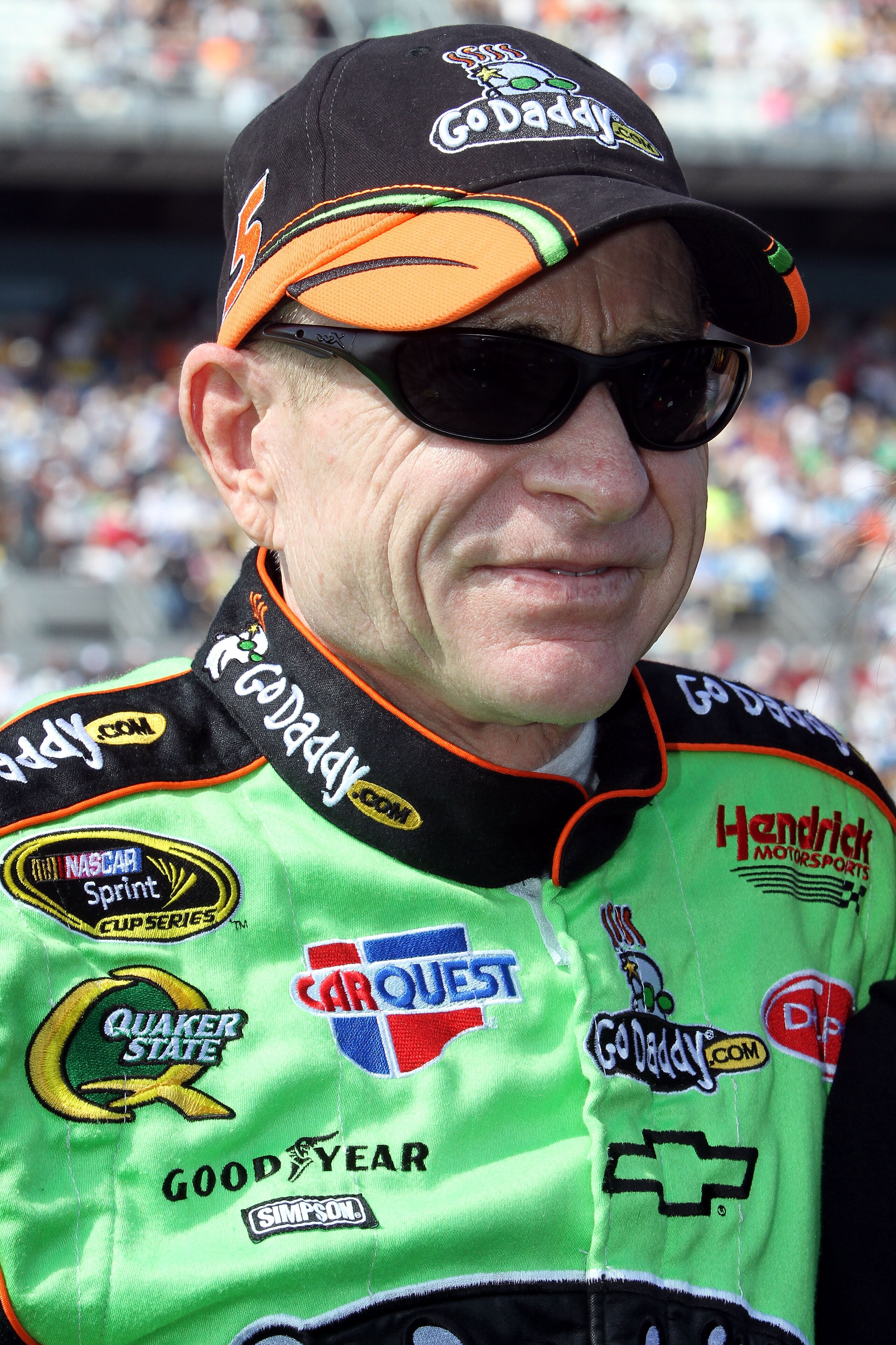 DAYTONA BEACH, FL - FEBRUARY 17:  Mark Martin, driver of the #5 GoDaddy.com Chevrolet, stands on the grid prior to the first race of the NASCAR Sprint Cup Series Gatorade Duel at Daytona International Speedway on February 17, 2011 in Daytona Beach, Florid