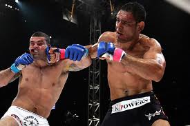 Nogueira landing a vicious right hook on Rua