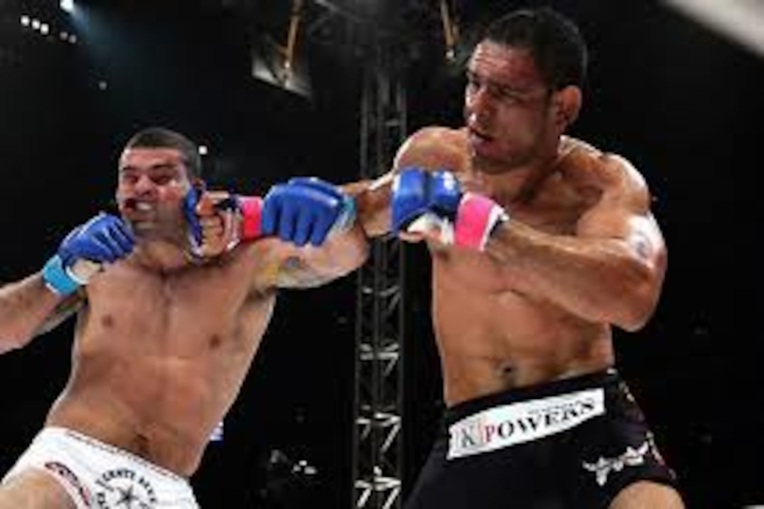 Nogueira landing a vicious right hook on Rua