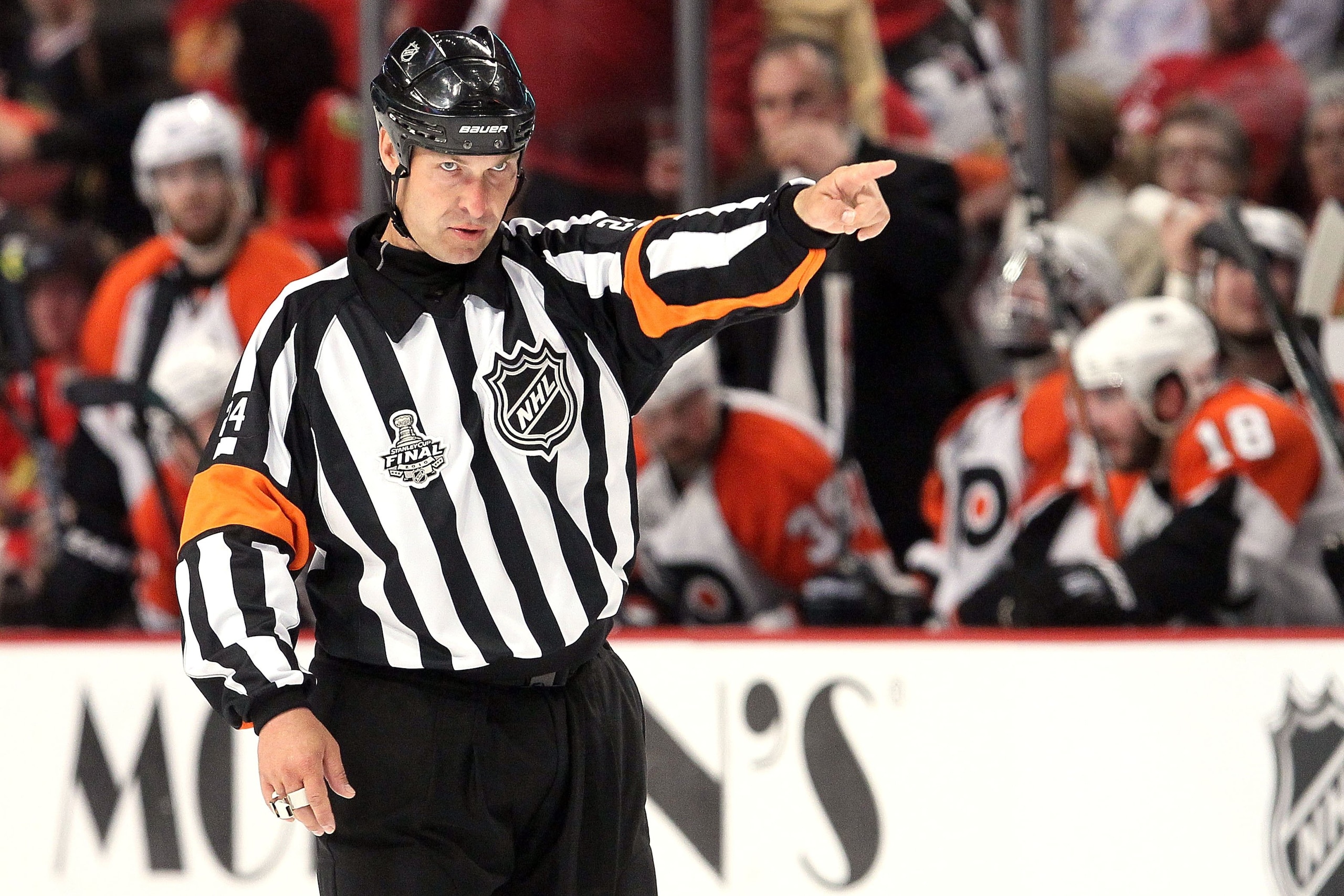 CHICAGO - MAY 31: Referee Stephen Walkom makes a call in Game Two of the 2010 NHL Stanley Cup Final between the Chicago Blackhawks and the Philadelphia Flyers at the United Center on May 31, 2010 in Chicago, Illinois. (Photo by Jim McIsaac/Getty Images) CHICAGO - MAY 31: Referee Stephen Walkom makes a call in Game Two of the 2010 NHL Stanley Cup Final between the Chicago Blackhawks and the Philadelphia Flyers at the United Center on May 31, 2010 in Chicago, Illinois. (Photo by Jim McIsaac/Getty Images)