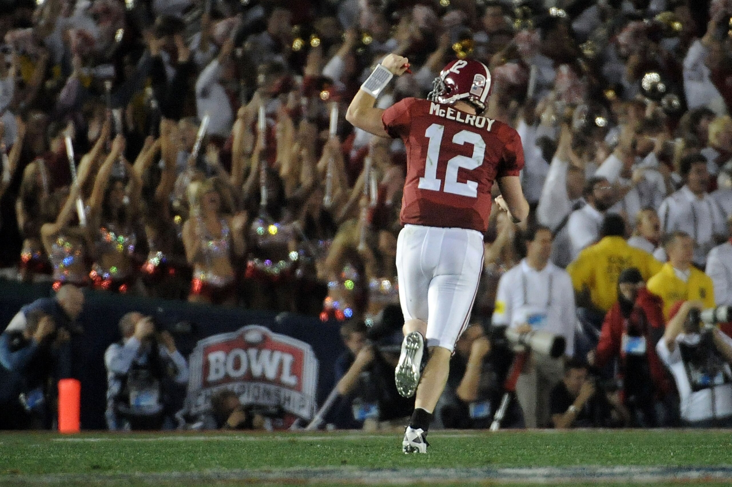 PASADENA, CA - JANUARY 07:  Quarterback Greg McElroy #12 of the Alabama Crimson Tide celebrates after a touchdown by running back Trent Richardson #3 against the Texas Longhorns in the second quarter of the Citi BCS National Championship game at the Rose