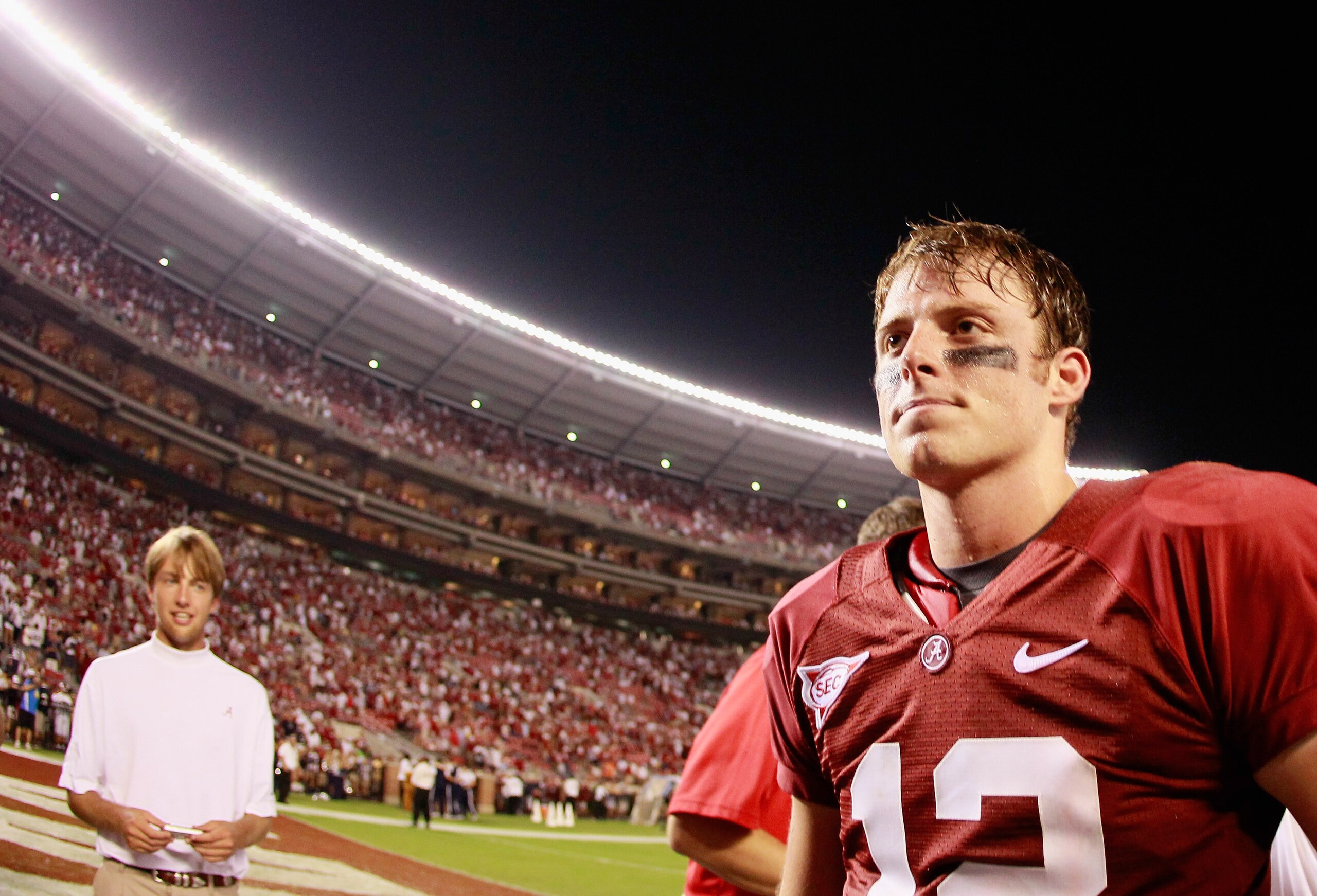 TUSCALOOSA, AL - SEPTEMBER 11:  Quarterback Greg McElroy #12 of the Alabama Crimson Tide walks off the field after their 24-3 win over the Penn State Nittany Lions at Bryant-Denny Stadium on September 11, 2010 in Tuscaloosa, Alabama.  (Photo by Kevin C. C