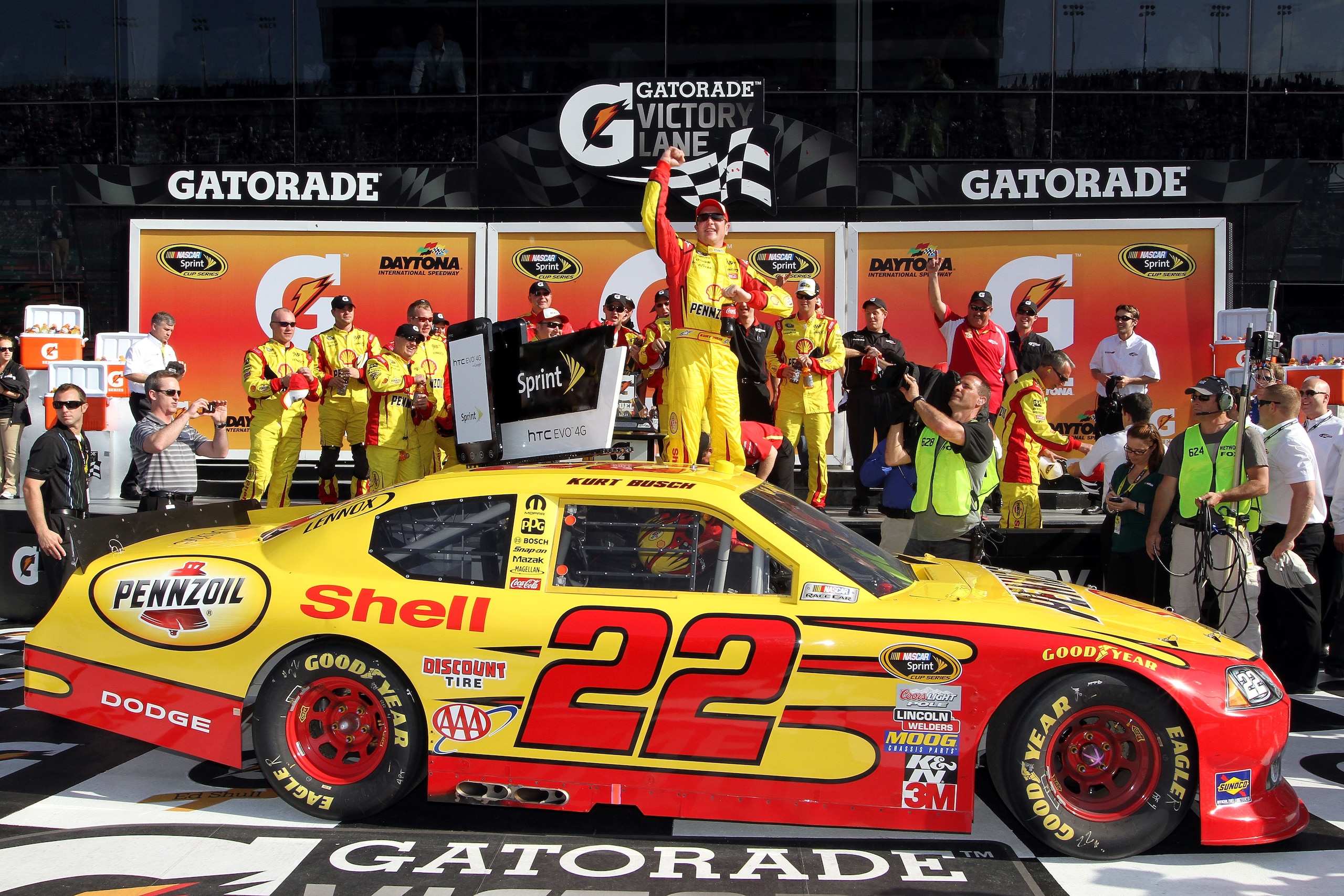 DAYTONA BEACH, FL - FEBRUARY 17: Kurt Busch, driver of the #22 Shell Pennzoil Dodge, celebrates in Victory Lane after winning the first race of the NASCAR Sprint Cup Series Gatorade Duel at Daytona International Speedway on February 17, 2011 in Daytona Be