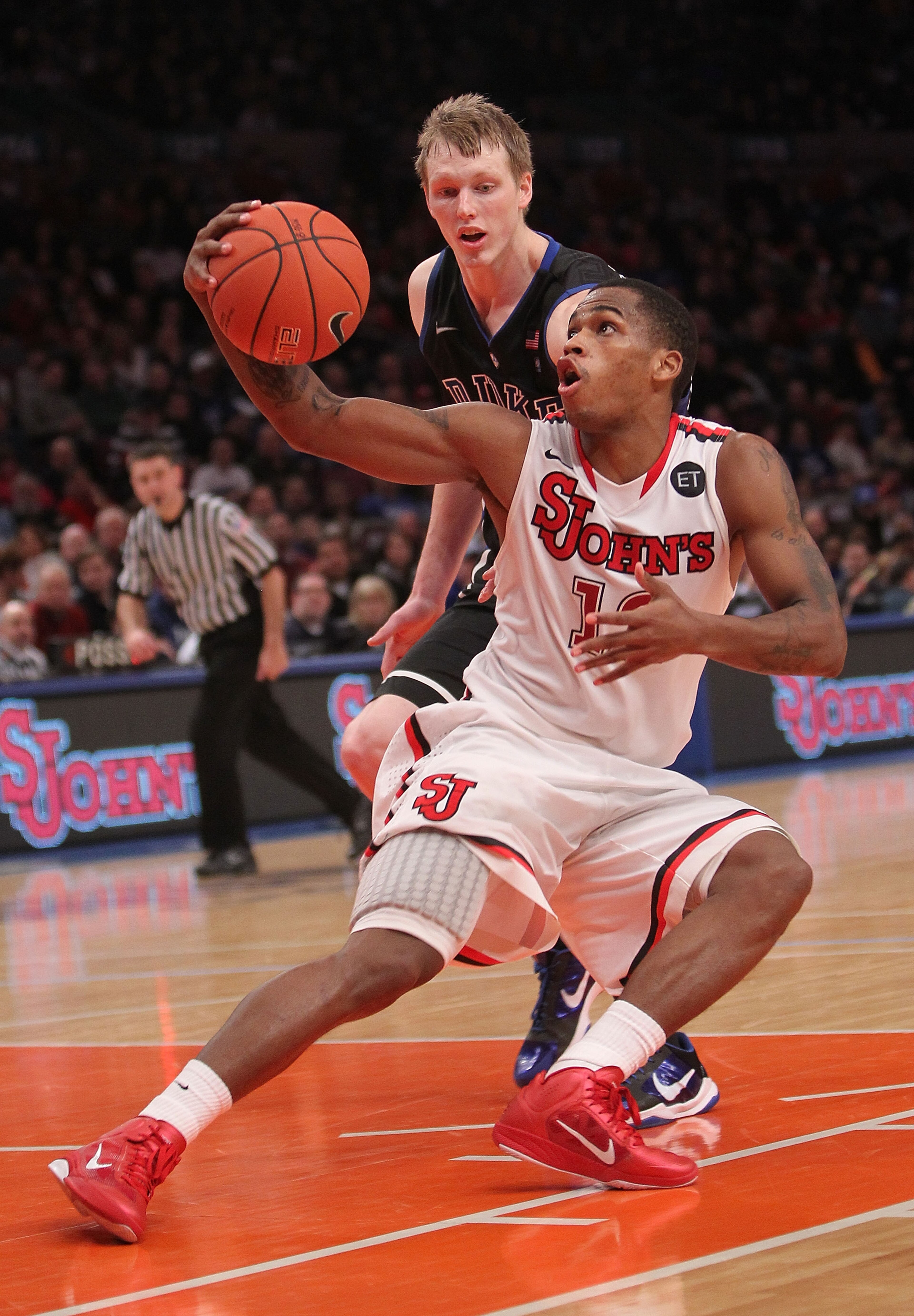 NEW YORK, NY - JANUARY 30: Dwight Hardy #12 of the St. John's Red Storm fakes in front of Kyle Singler #12 of the Duke Blue Devils at Madison Square Garden on January 30, 2011 in New York City. (Photo by Nick Laham/Getty Images) NEW YORK, NY - JANUARY 30: Dwight Hardy #12 of the St. John's Red Storm fakes in front of Kyle Singler #12 of the Duke Blue Devils at Madison Square Garden on January 30, 2011 in New York City. (Photo by Nick Laham/Getty Images)