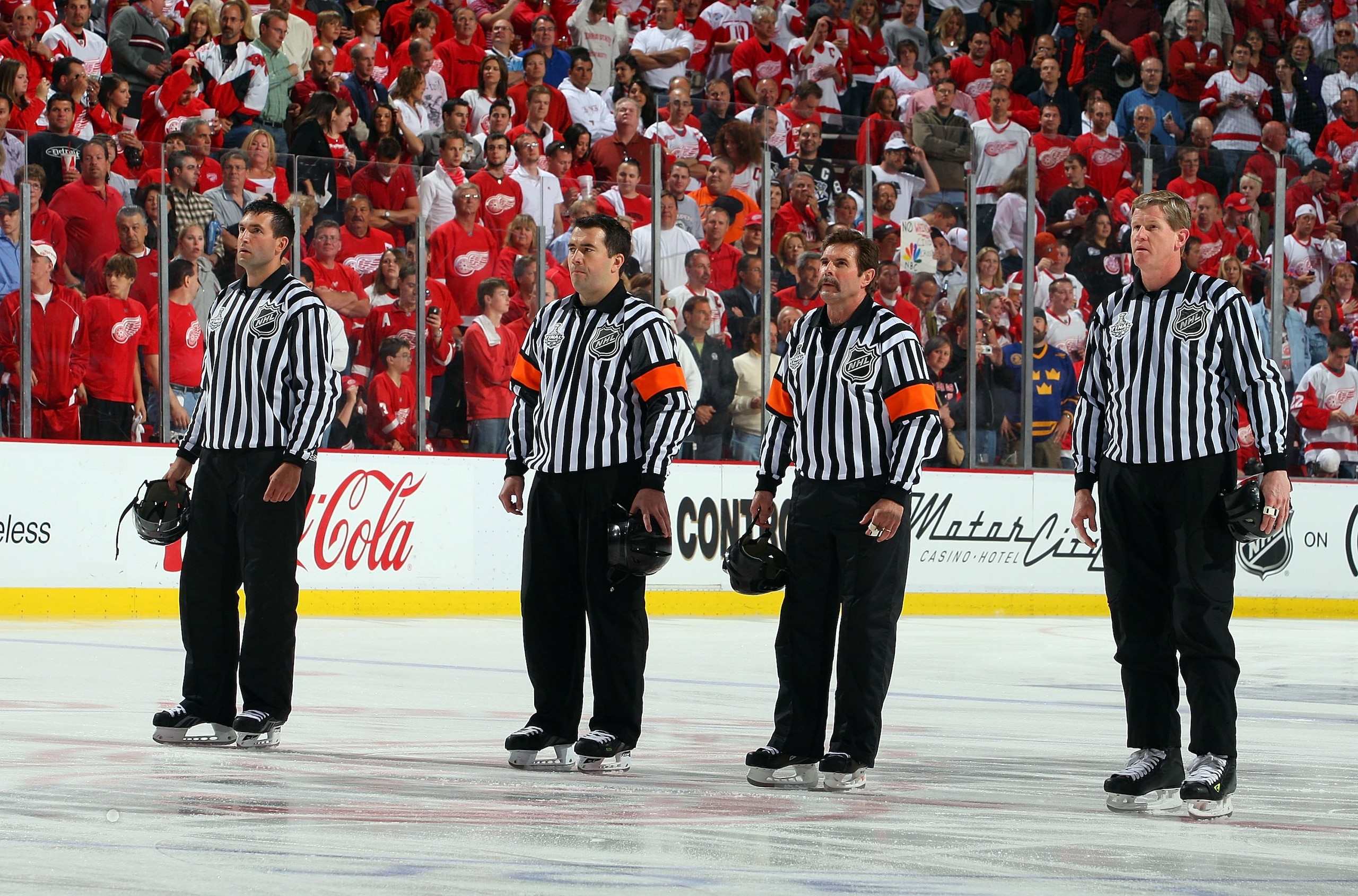 DETROIT - MAY 31: (L-R) Linesman Steve Miller, referees Marc Joannette and Bill McCreary, and linesman Jean Morin line up for the national anthem prior to the Pittsburgh Penguins playing the Detroit Red Wings during Game Two of the 2009 Stanley Cup Final DETROIT - MAY 31: (L-R) Linesman Steve Miller, referees Marc Joannette and Bill McCreary, and linesman Jean Morin line up for the national anthem prior to the Pittsburgh Penguins playing the Detroit Red Wings during Game Two of the 2009 Stanley Cup Final