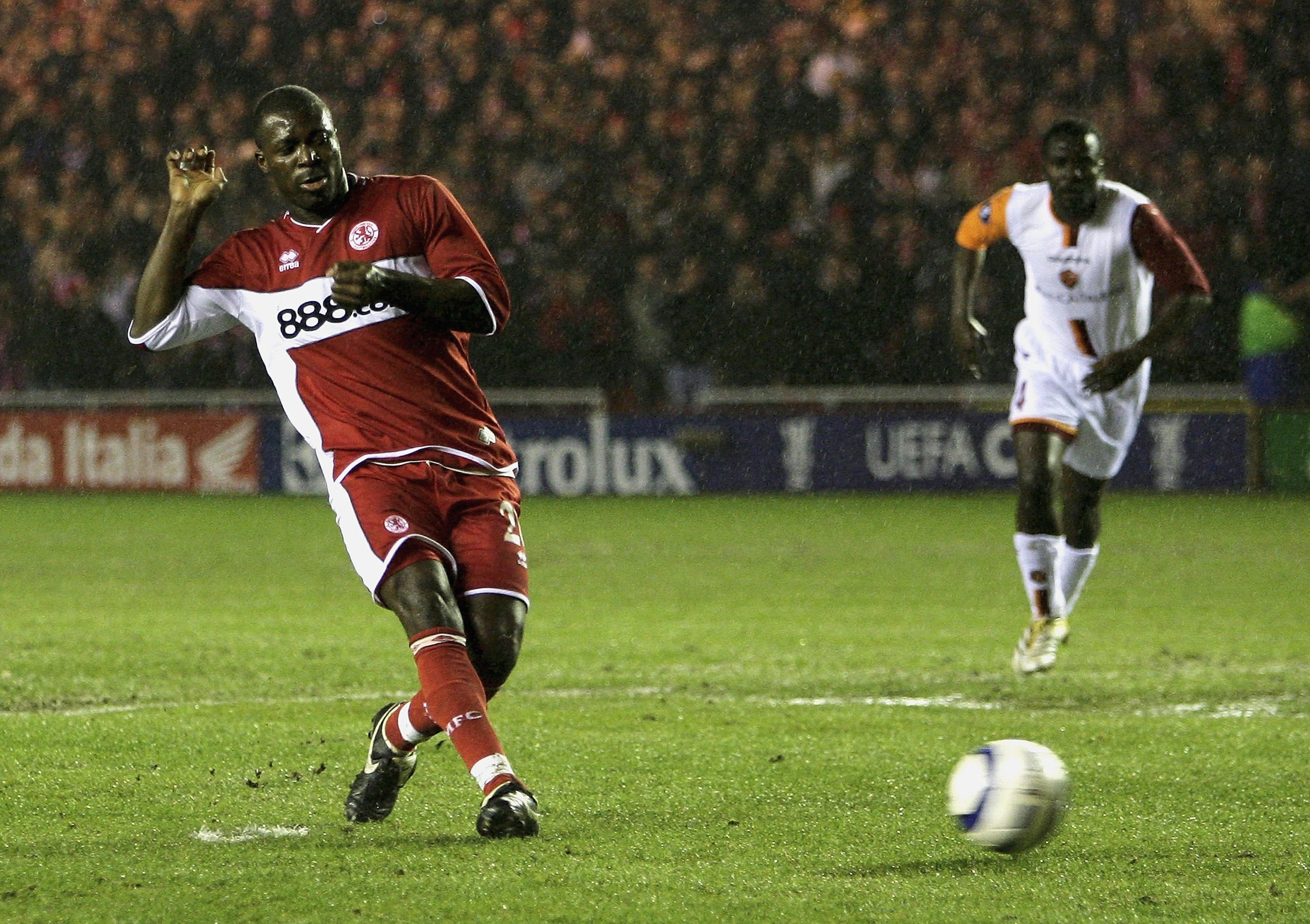 MIDDLESBROUGH, ENGLAND - MARCH 9:  Yakubu of Middlesbrough scores a goal during the UEFA Cup Round of 16 First Leg match between Middlesbrough and AS Roma at the Riverside Stadium on March 9, 2006 in Middlesbrough, England.  (Photo by Matthew Lewis/Getty