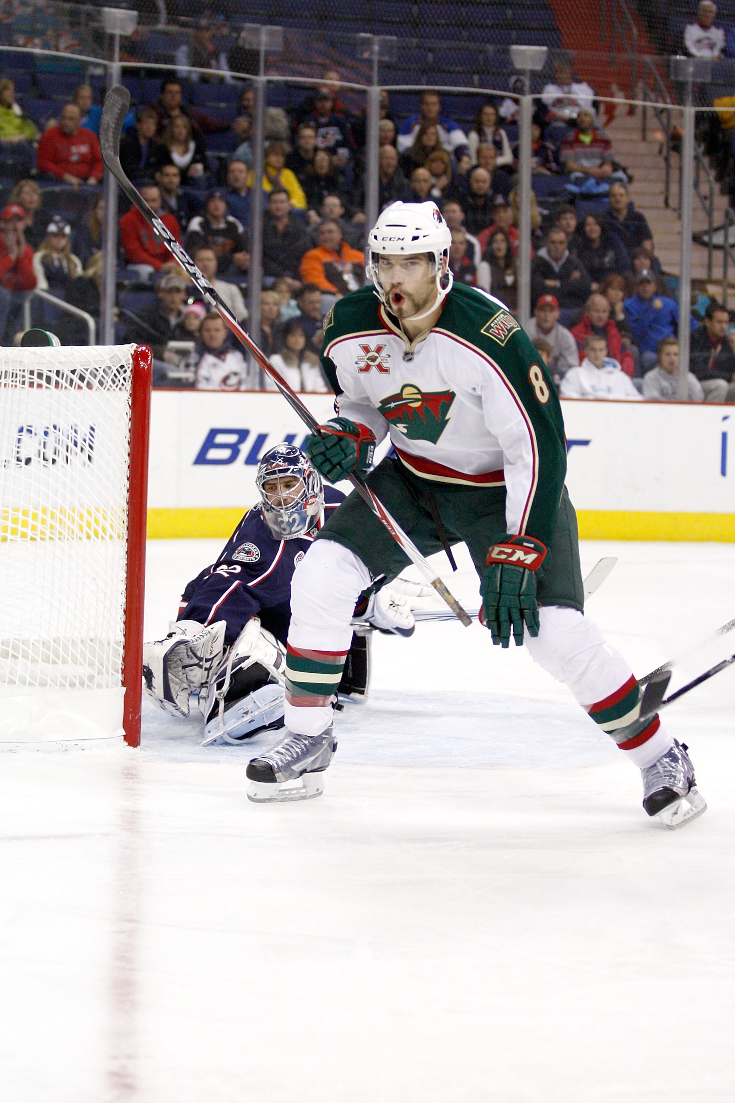 COLUMBUS, OH - NOVEMBER 6:  Brent Burns #8 of the Minnesota Wild celebrates after beating Mathieu Garon #32 of the Columbus Blue Jackets for a goal during the first period on November 6, 2010 at Nationwide Arena in Columbus, Ohio.  (Photo by John Grieshop
