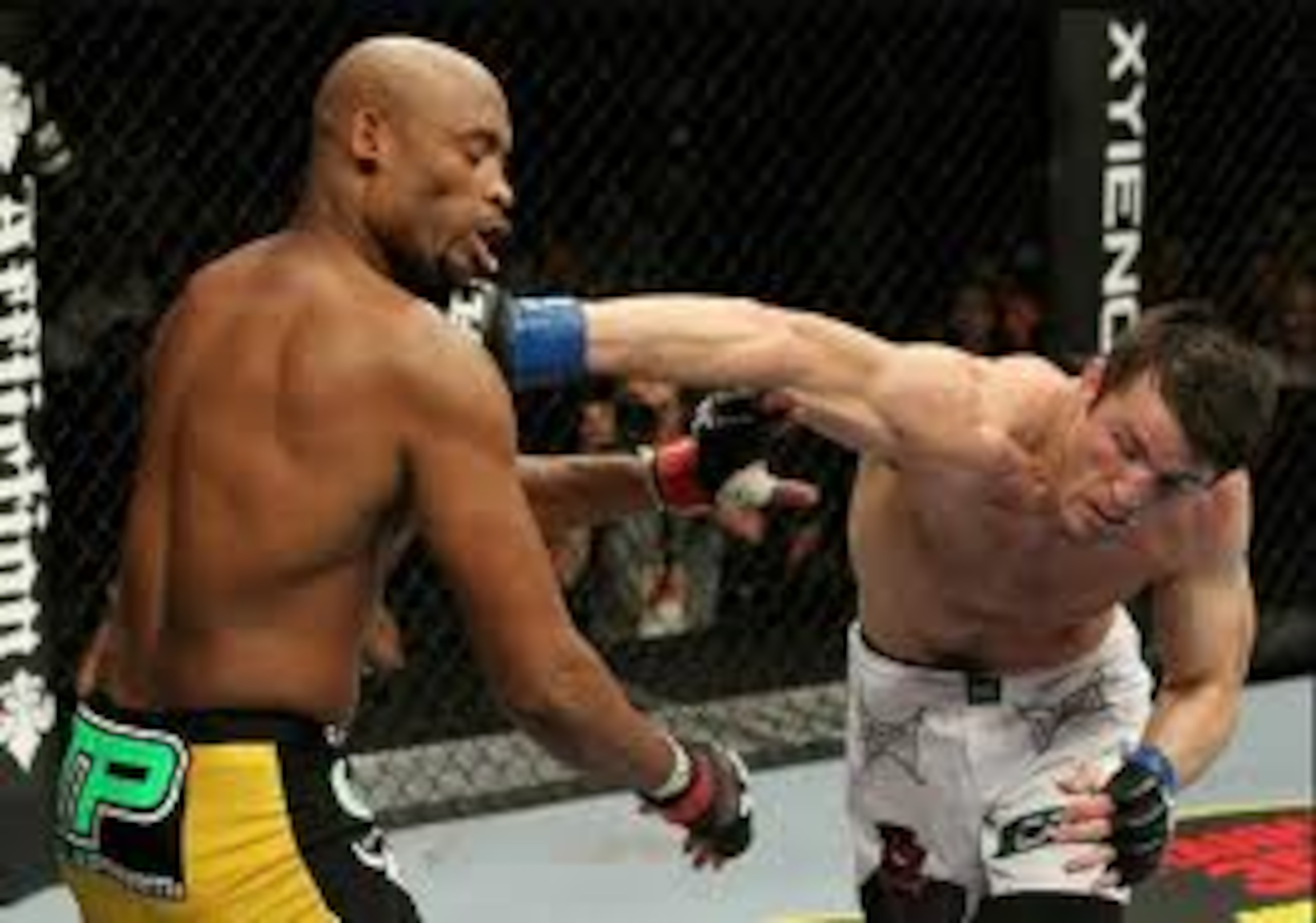 Chael Sonnen landing an overhand right on Anderson Silva