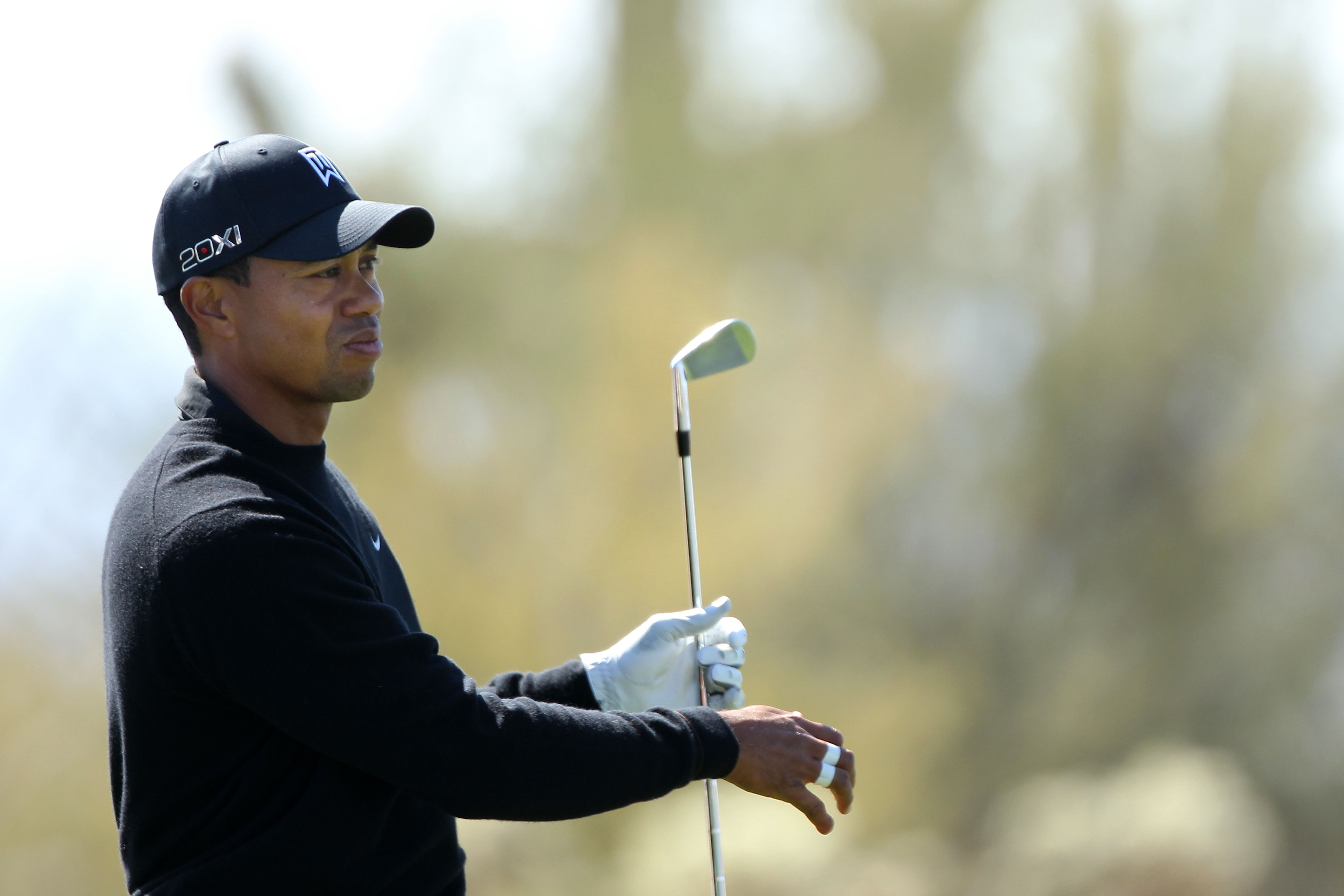 MARANA, AZ - FEBRUARY 23:  Tiger Woods reacts to his shot during the first round of the Accenture Match Play Championship at the Ritz-Carlton Golf Club on February 23, 2011 in Marana, Arizona.  (Photo by Andy Lyons/Getty Images)