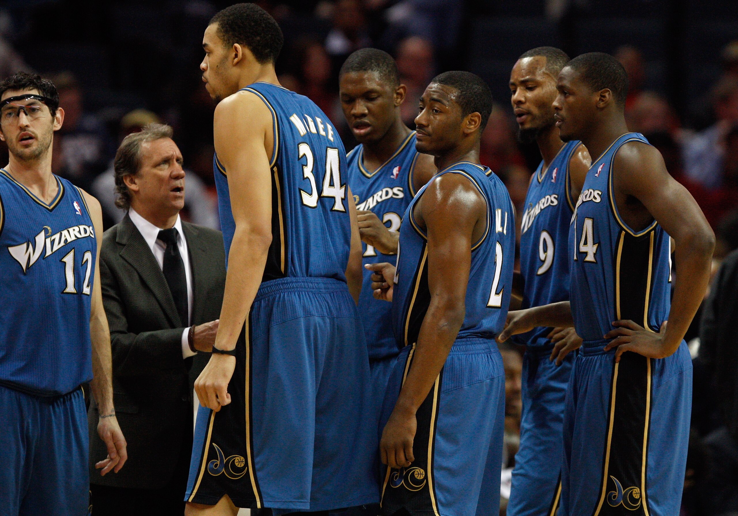 CHARLOTTE, NC - JANUARY 08: Head coach Flip Saunders of the Washington Wizards talks to his team on the sidelines during their game agains the Charlotte Bobcats at Time Warner Cable Arena on January 8, 2011 in Charlotte, North Carolina. NOTE TO USER: Use CHARLOTTE, NC - JANUARY 08: Head coach Flip Saunders of the Washington Wizards talks to his team on the sidelines during their game agains the Charlotte Bobcats at Time Warner Cable Arena on January 8, 2011 in Charlotte, North Carolina. NOTE TO USER: Use