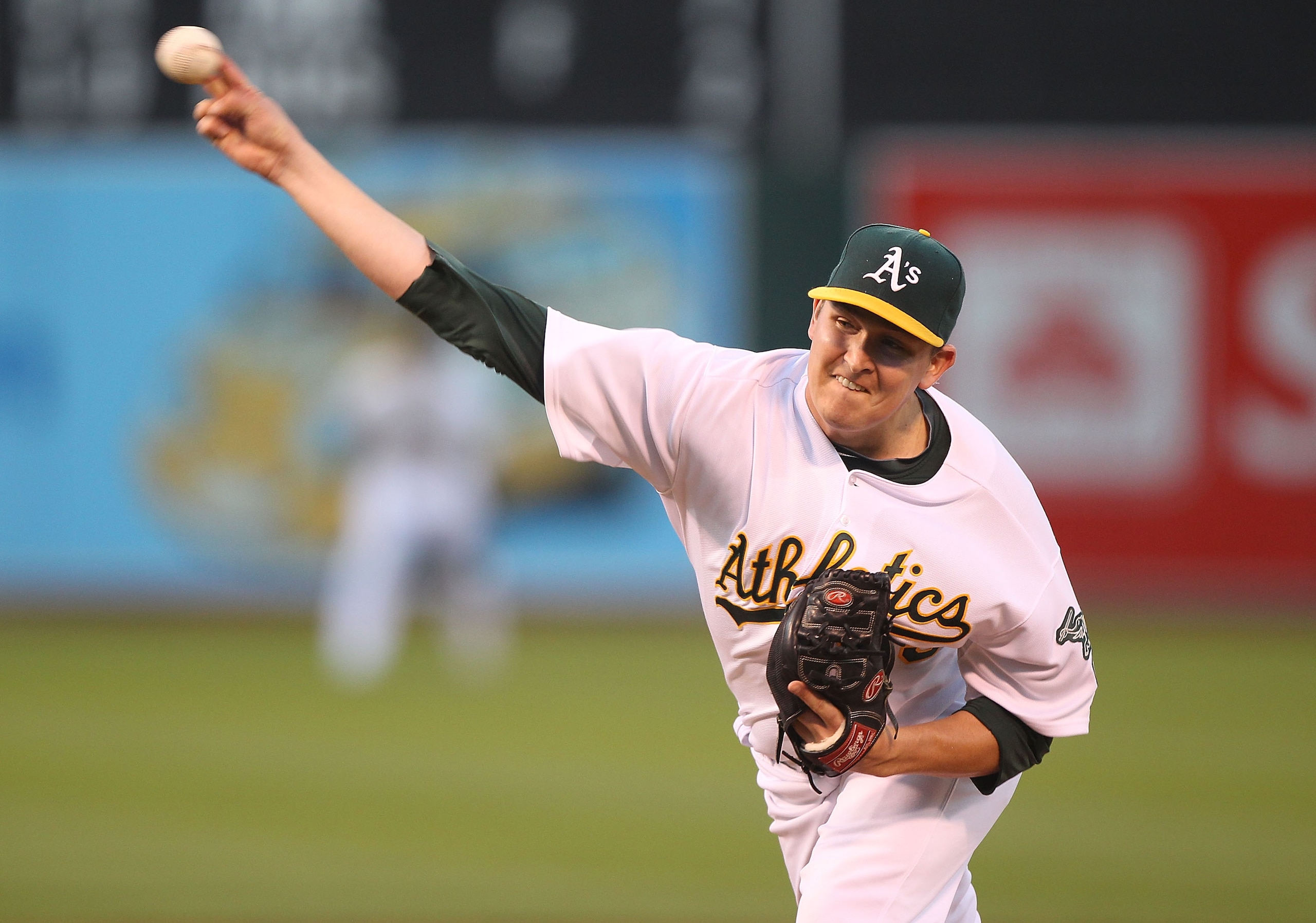 OAKLAND, CA - AUGUST 19:  Trevor Cahill #53 of the Oakland Athletics pitches against the Tampa Bay Rays during an MLB game at the Oakland-Alameda County Coliseum on August 19, 2010 in Oakland, California.  (Photo by Jed Jacobsohn/Getty Images)