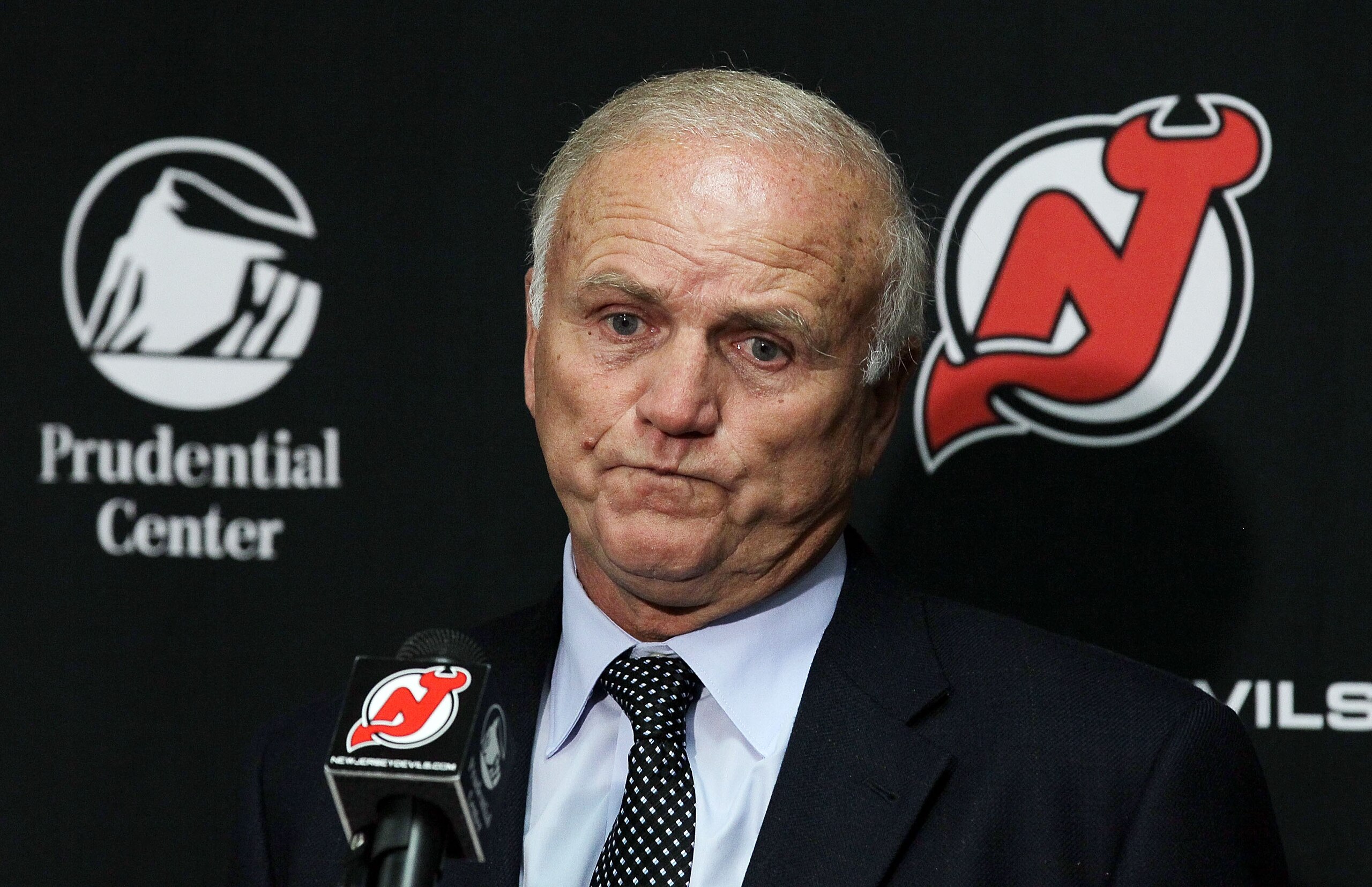 NEWARK, NJ - DECEMBER 23: Head coach Jacques Lemaire of the New Jersey Devils speaks to the media after their game against the New York Islanders at the Prudential Center on December 23, 2010 in Newark, New Jersey. The Isles defeated the Devils 5-1. (Ph NEWARK, NJ - DECEMBER 23: Head coach Jacques Lemaire of the New Jersey Devils speaks to the media after their game against the New York Islanders at the Prudential Center on December 23, 2010 in Newark, New Jersey. The Isles defeated the Devils 5-1. (Ph