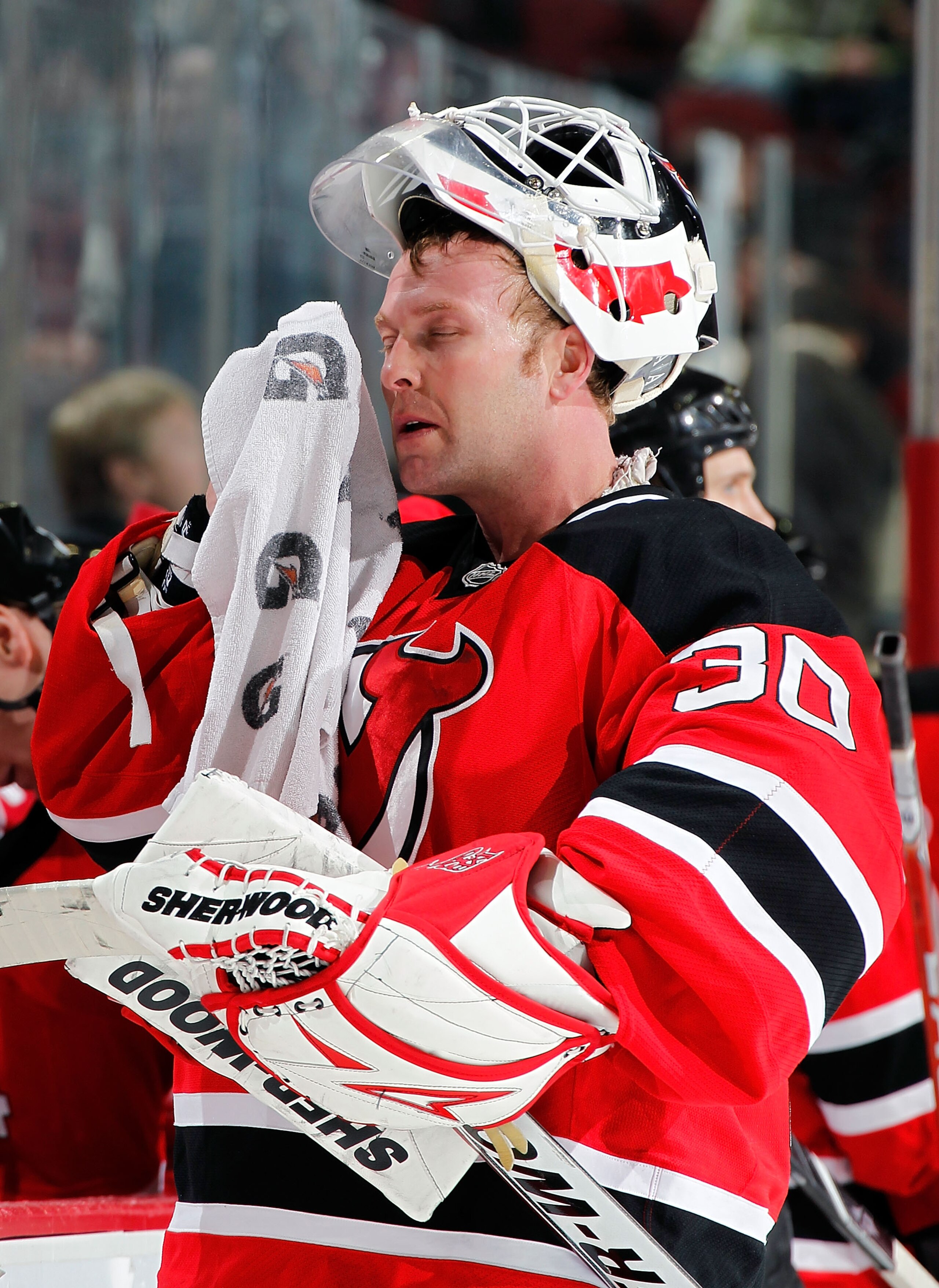 NEWARK, NJ - JANUARY 20: Goalie Martin Brodeur #30 of the New Jersey Devils takes a break during his shutout win in an NHL hockey game against the Pittsburgh Penguins at the Prudential Center on January 20, 2011 in Newark, New Jersey. (Photo by Paul Ber NEWARK, NJ - JANUARY 20: Goalie Martin Brodeur #30 of the New Jersey Devils takes a break during his shutout win in an NHL hockey game against the Pittsburgh Penguins at the Prudential Center on January 20, 2011 in Newark, New Jersey. (Photo by Paul Ber