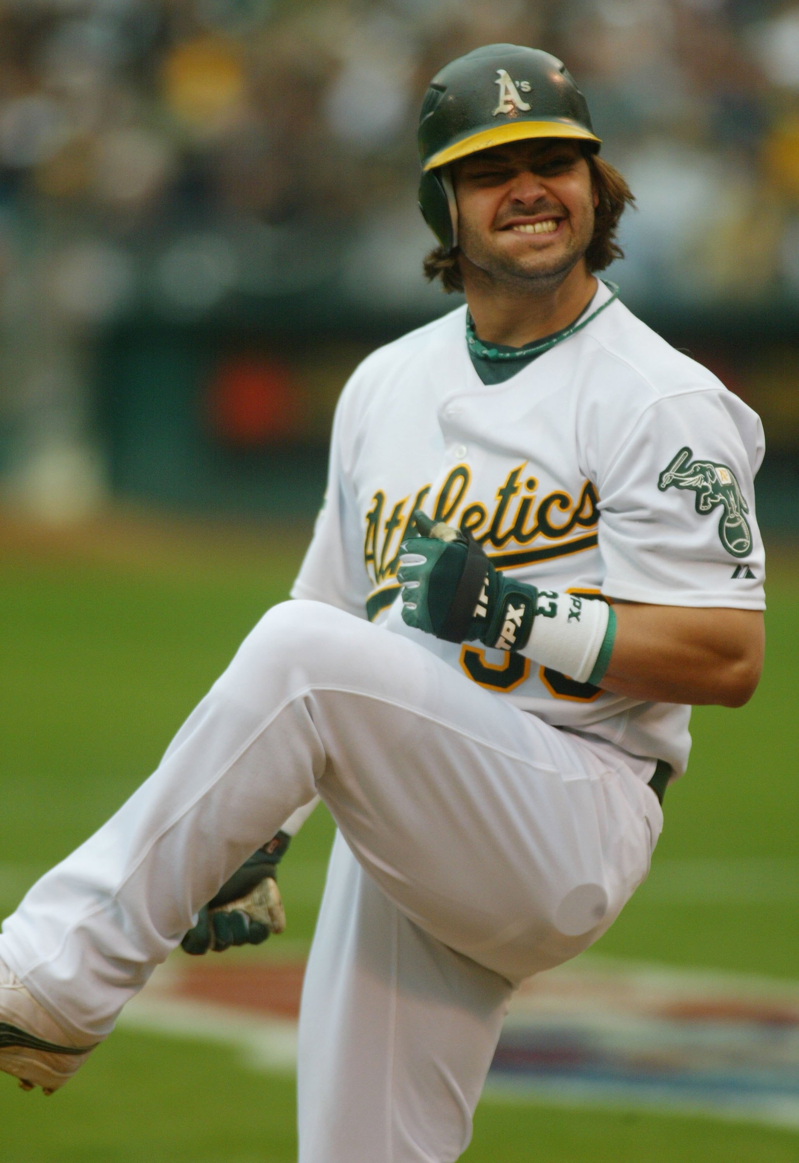 OAKLAND, CA - OCTOBER 06:   Nick Swisher #33 of the Oakland Athletics reacts to striking out against the Minnesota Twins during game three of the American League Division Series at McAfee Coliseum on October 6, 2006 in Oakland, California.  (Photo by Sara