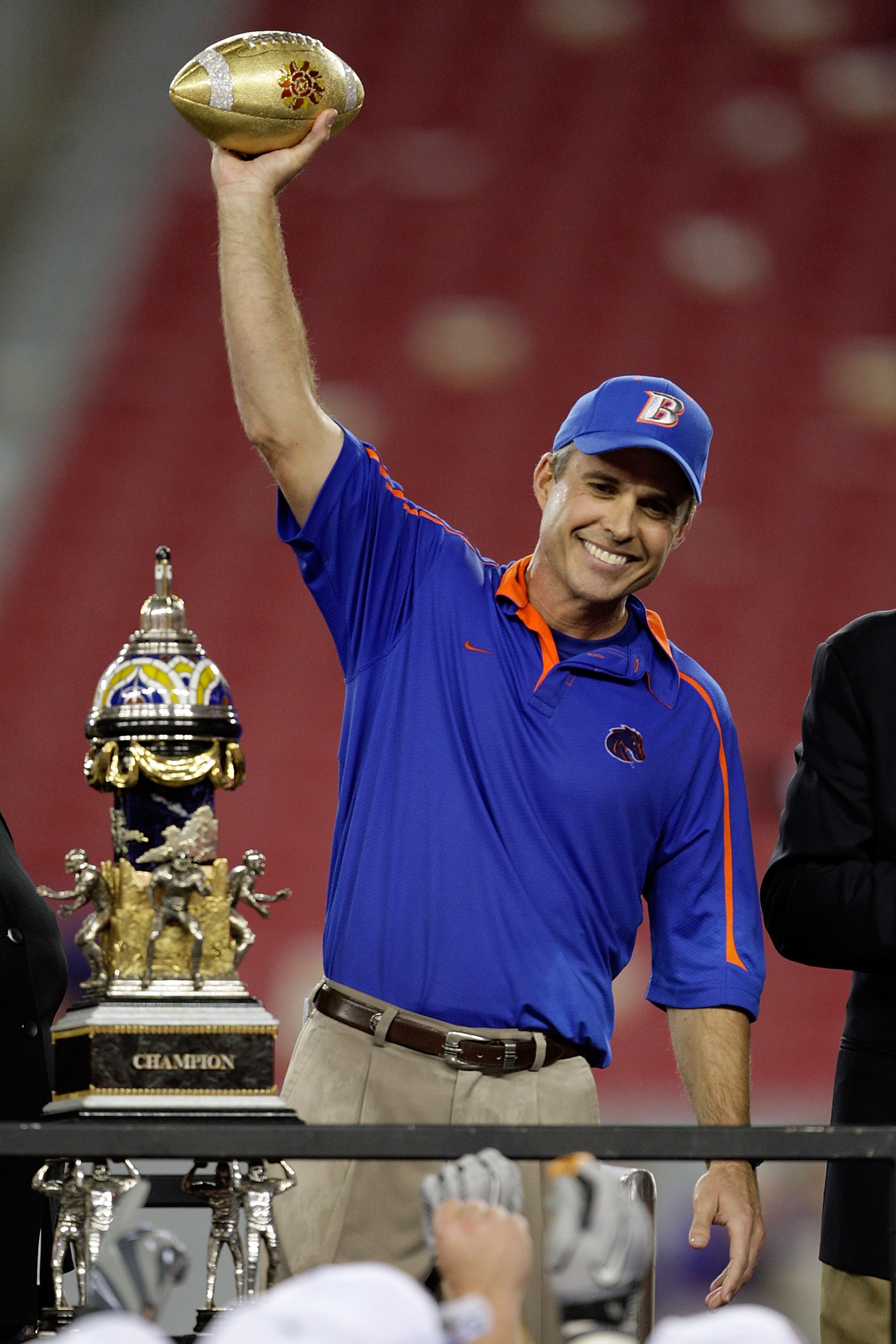 GLENDALE, AZ - JANUARY 04:  Head coach Chris Petersen of the Boise State Broncos celebrates after defeating the TCU Horned Frogs 17-10 during the Tostitos Fiesta Bowl at the Universtity of Phoenix Stadium on January 4, 2010 in Glendale, Arizona.  (Photo b