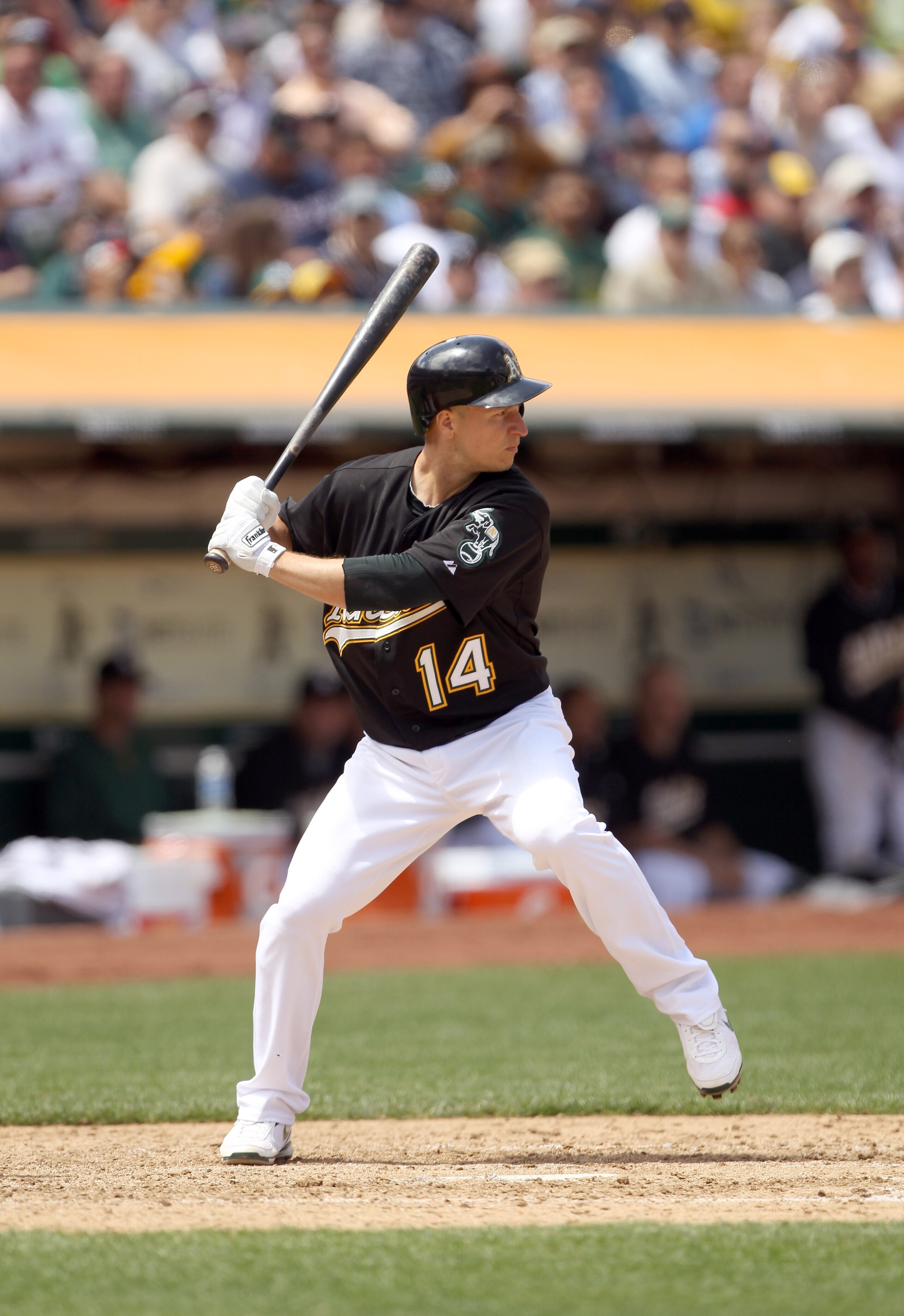 OAKLAND, CA - JULY 21:  Mark Ellis #14 of the Oakland Athletics bats against the Boston Red Sox at the Oakland-Alameda County Coliseum on July 21, 2010 in Oakland, California.  (Photo by Ezra Shaw/Getty Images)