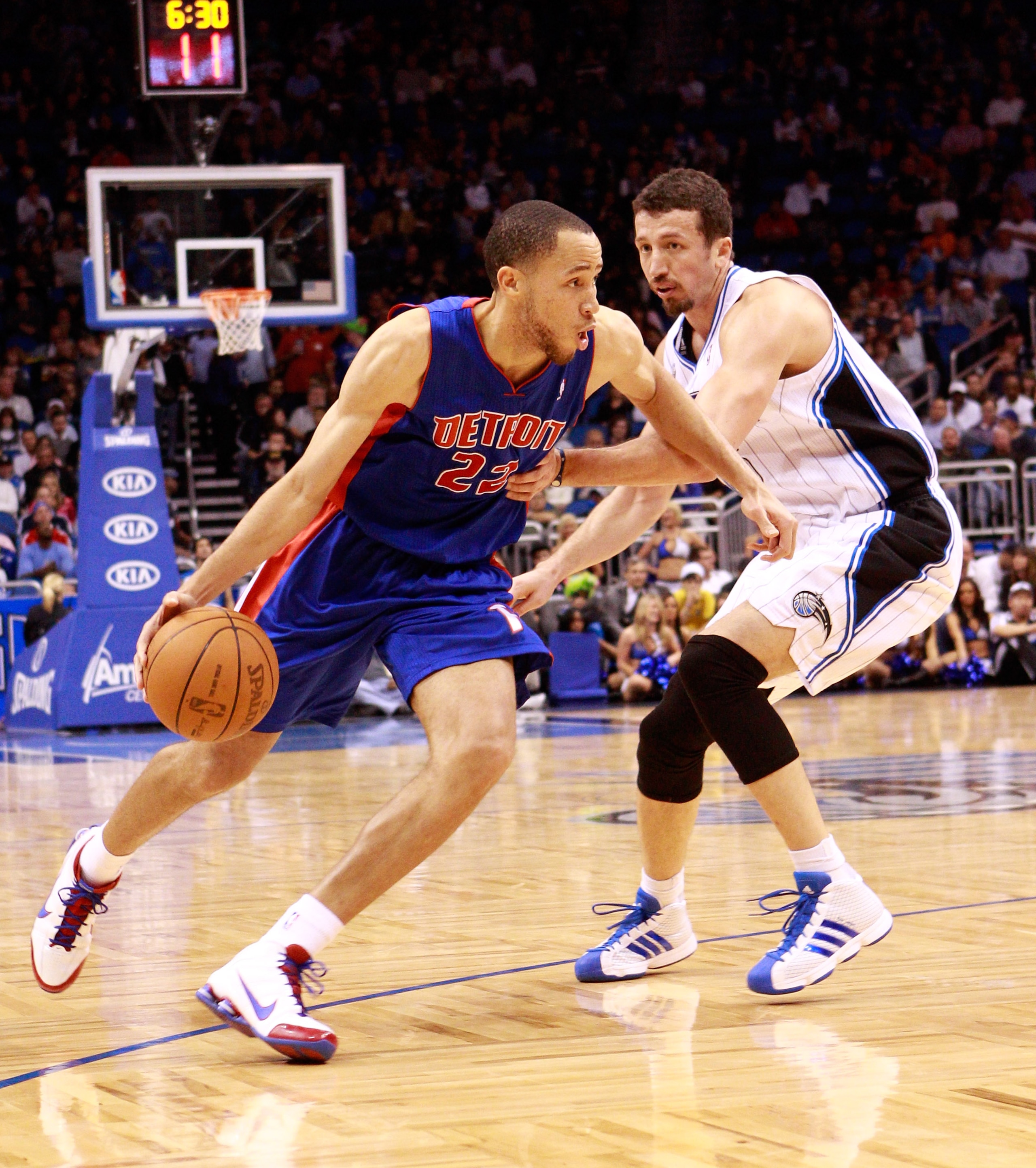ORLANDO, FL - JANUARY 24:  Tayshaun Prince #22 of the Detroit Pistons drives against Hedo Turkoglu #15 of the Orlando Magic during the game at Amway Arena on January 24, 2011 in Orlando, Florida.  NOTE TO USER: User expressly acknowledges and agrees that,