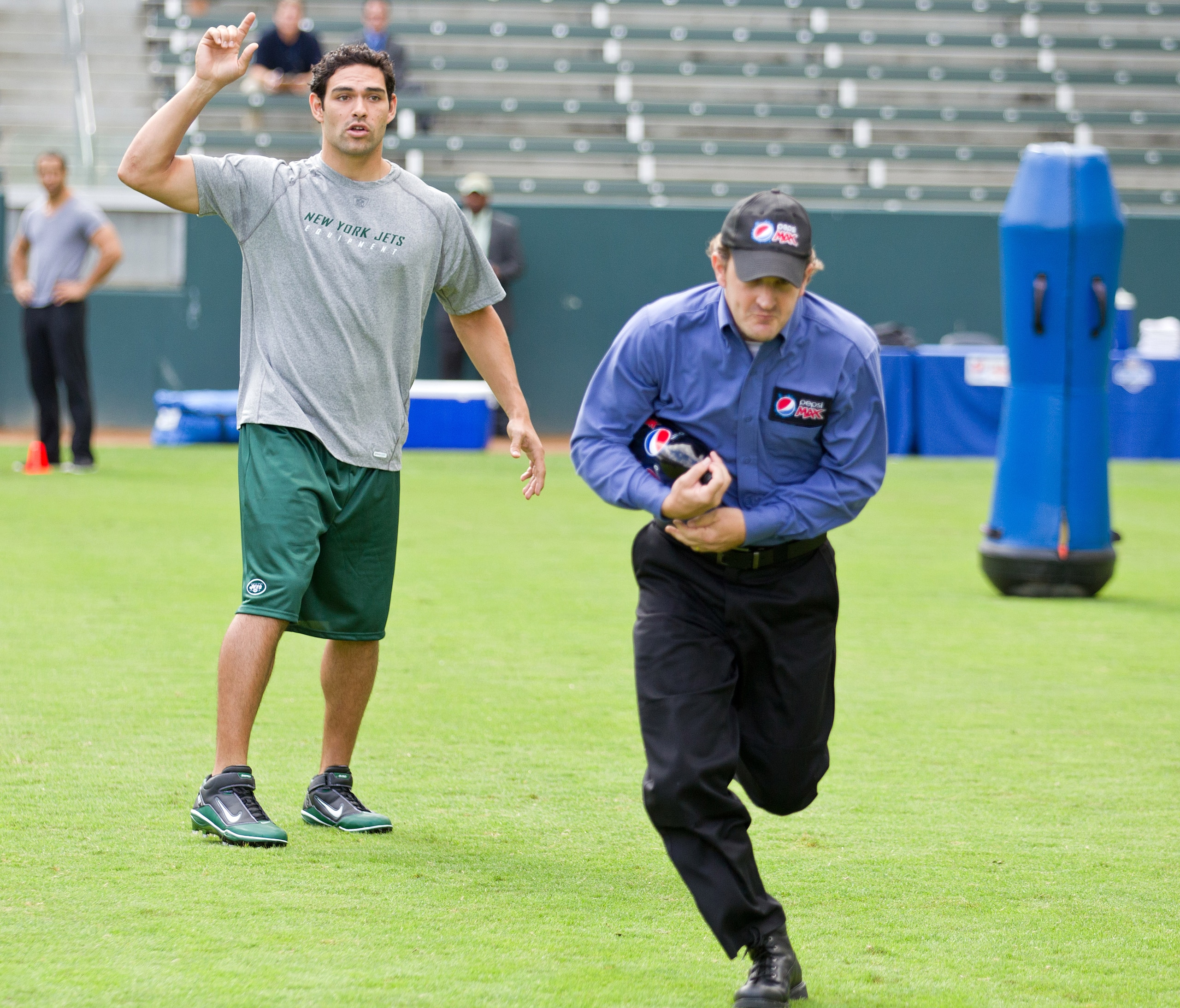 CARSON, CA - OCTOBER 22:  New York Jets quarterback Mark Sanchez shoots a scene with the Pepsi MAX driver on the set of the new zero calorie Pepsi MAX NFL commercial at The Home Depot Center on October 22, 2010 in Carson, California. The ad, which debuts