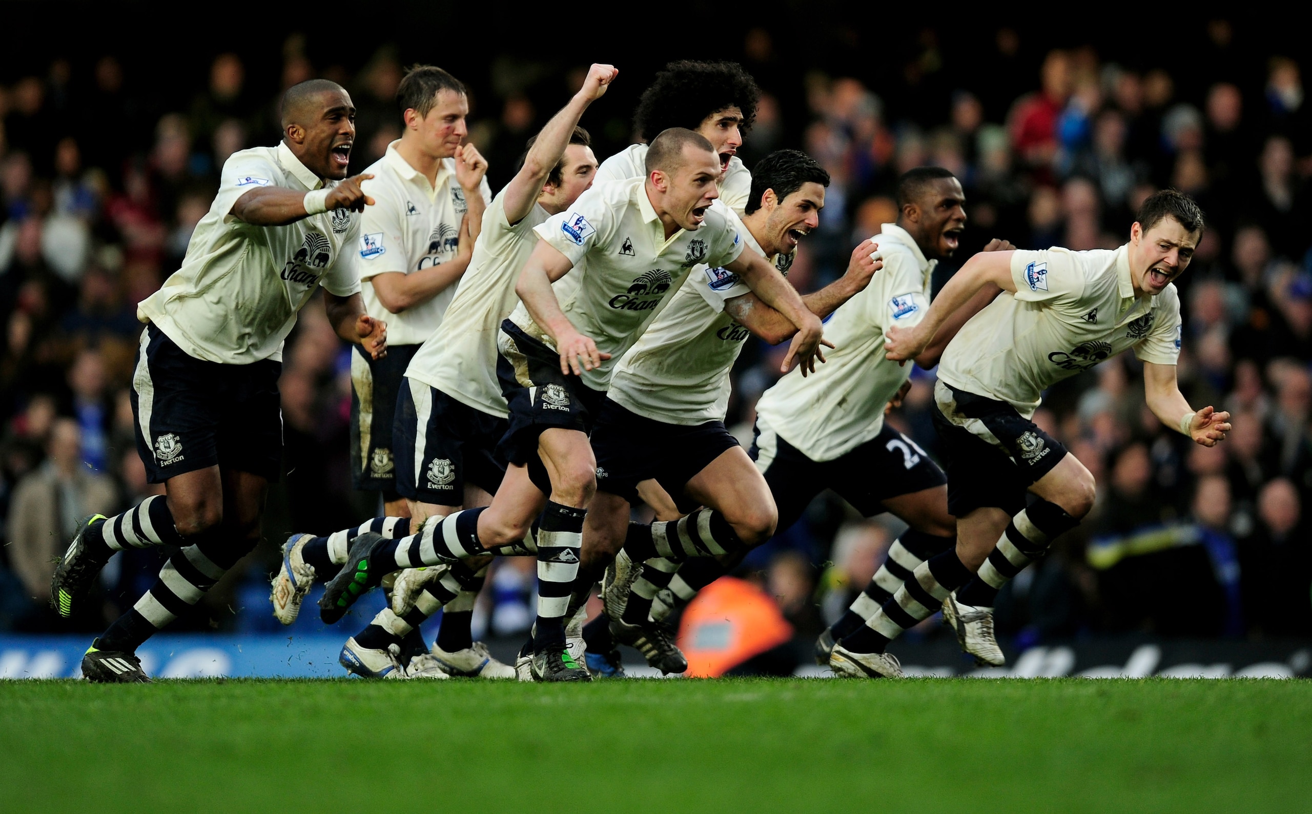 LONDON, ENGLAND - FEBRUARY 19: Everton players celebrate after their captain Phil Neville scores his penalty to win 4-3 on penalties during the FA Cup sponsored by E.ON 4th round replay match between Chelsea and Everton at Stamford Bridge on February 19, LONDON, ENGLAND - FEBRUARY 19: Everton players celebrate after their captain Phil Neville scores his penalty to win 4-3 on penalties during the FA Cup sponsored by E.ON 4th round replay match between Chelsea and Everton at Stamford Bridge on February 19,