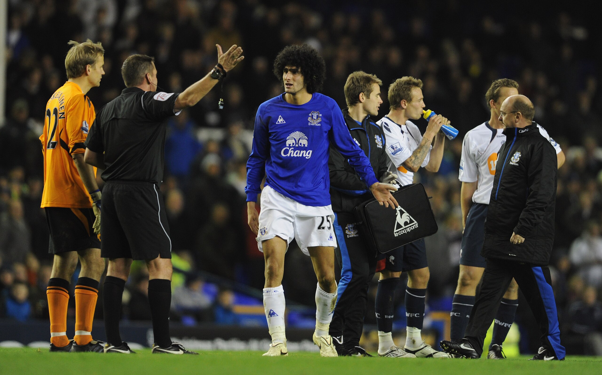 LIVERPOOL, ENGLAND - NOVEMBER 10: Marouane Fellaini of Everton protests to referee Phil Dowd after being sent off during the Barclays Premier League match between Everton and Bolton Wanderers at Goodison Park on November 10, 2010 in Liverpool, England. LIVERPOOL, ENGLAND - NOVEMBER 10: Marouane Fellaini of Everton protests to referee Phil Dowd after being sent off during the Barclays Premier League match between Everton and Bolton Wanderers at Goodison Park on November 10, 2010 in Liverpool, England.