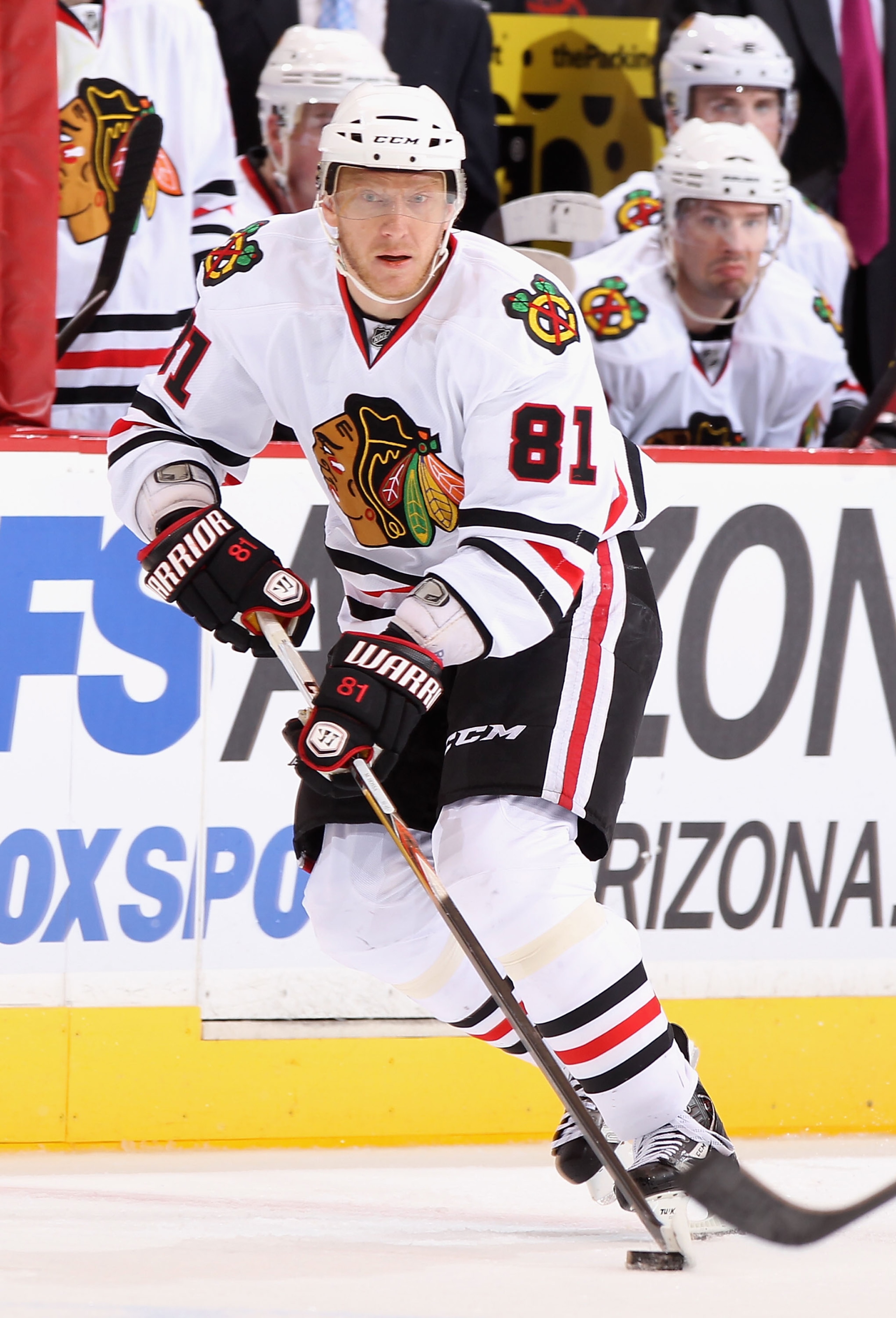 GLENDALE, AZ - FEBRUARY 12:  Marian Hossa #81 of the Chicago Blackhawks skates with the puck during the NHL game against the Phoenix Coyotes at Jobing.com Arena on February 12, 2011 in Glendale, Arizona.  The Coyotes defeated the Blackhawks 3-2 in an over